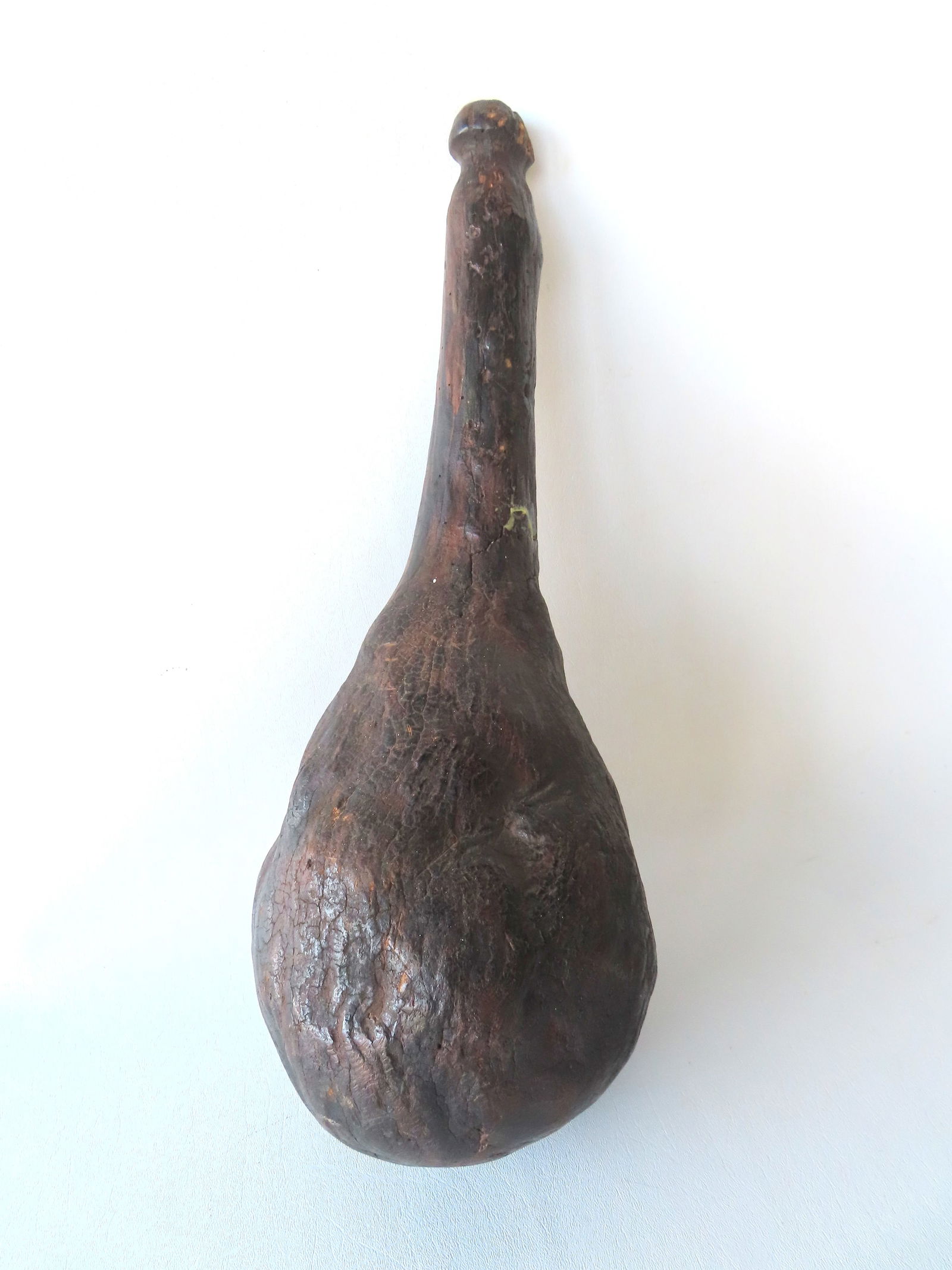 A large natural burlwood pestle with carved knob on end of handle, probably Native American for (1 of 8)