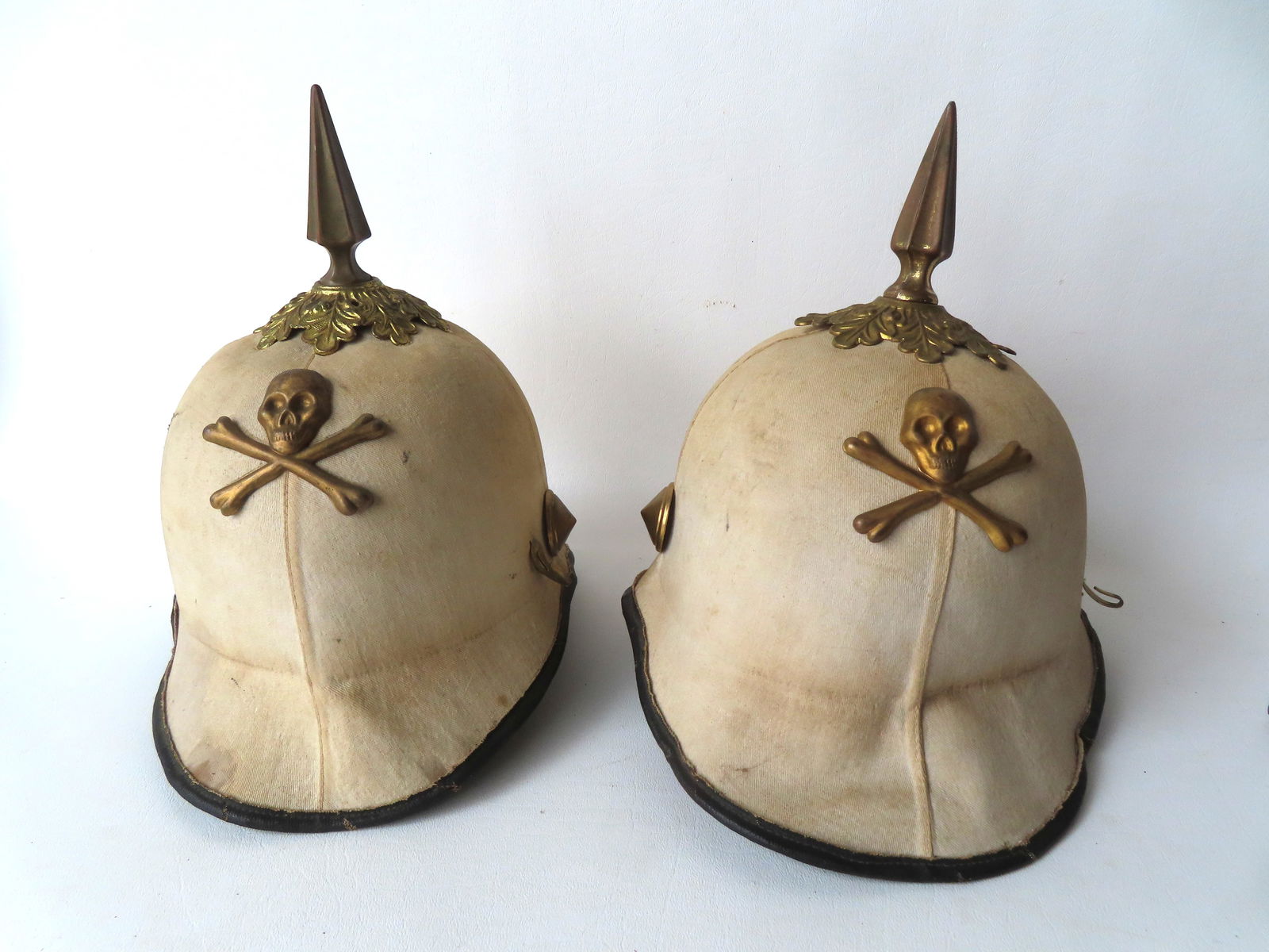 Two fraternal lodge spiked helmets with applied skull and cross-bone ornaments attached to the (1 of 13)