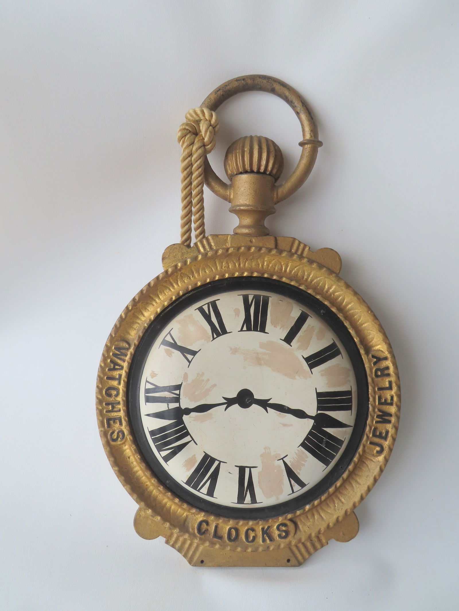 A cast iron double sided pocket watch trade store sign, 19th century, with rounded painted tin dials (1 of 11)