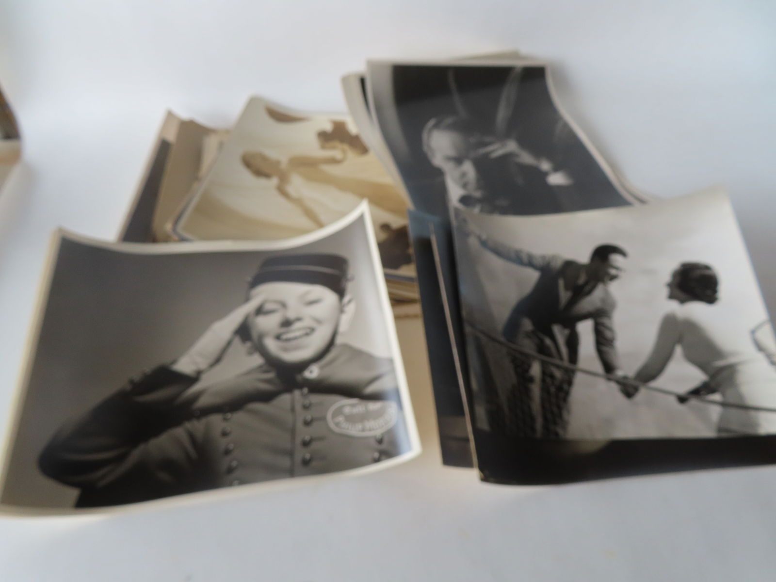 A grouping of 28 black and white photos, some advertising related, including 3 for Phillip Morris (1 of 20)