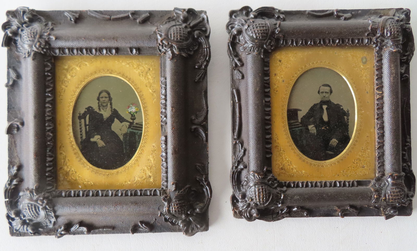 Two framed quarter-plate ambrotype portraits of man and woman, both housed in matching faux gutta (1 of 7)