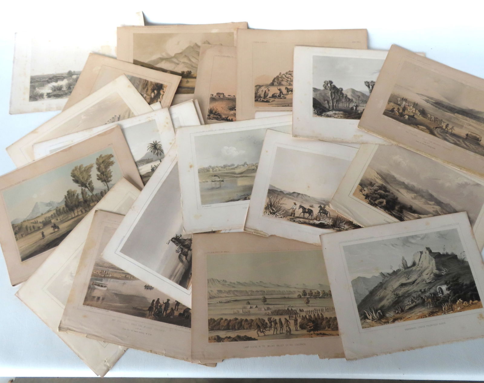 A grouping of 43 USPRR Exposition & Surveys lithographs (Pacific Railroad), all hand colored western: A grouping of 43 USPRR Exposition & Surveys lithographs (Pacific Railroad), all hand colored western landscapes, circa 1850. Each approximately 8 3/4" x 11 3/8". Some foxing, discoloration, minor loss