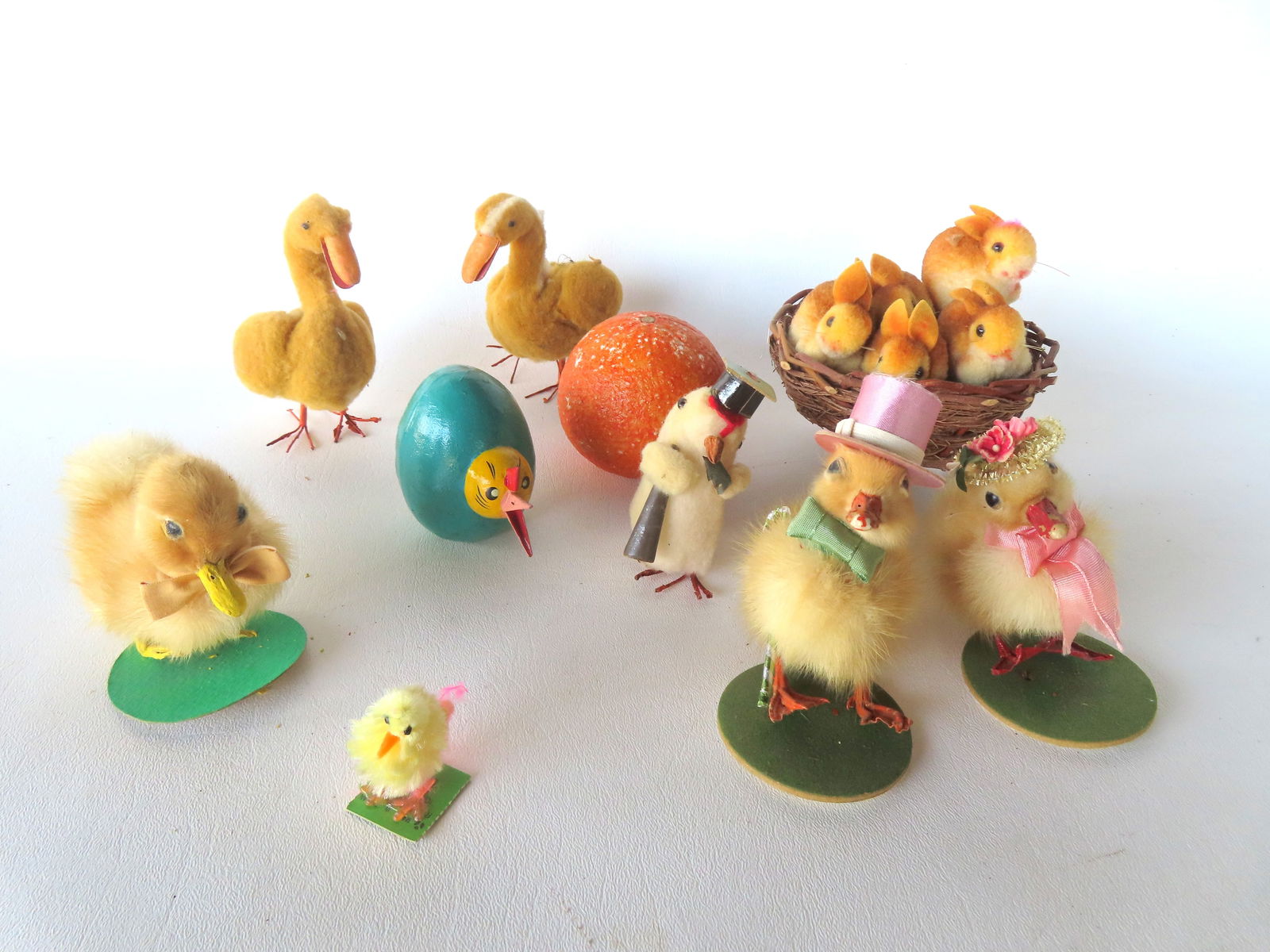 Grouping of mostly small furry Easter creatures, all made in Japan, circa 1950-70 - most in: Grouping of mostly small furry Easter creatures, all made in Japan, circa 1950-70 - most in very good condition. The largest, the chick with the purple hat, measures 4"H x 4 1/4"W.
