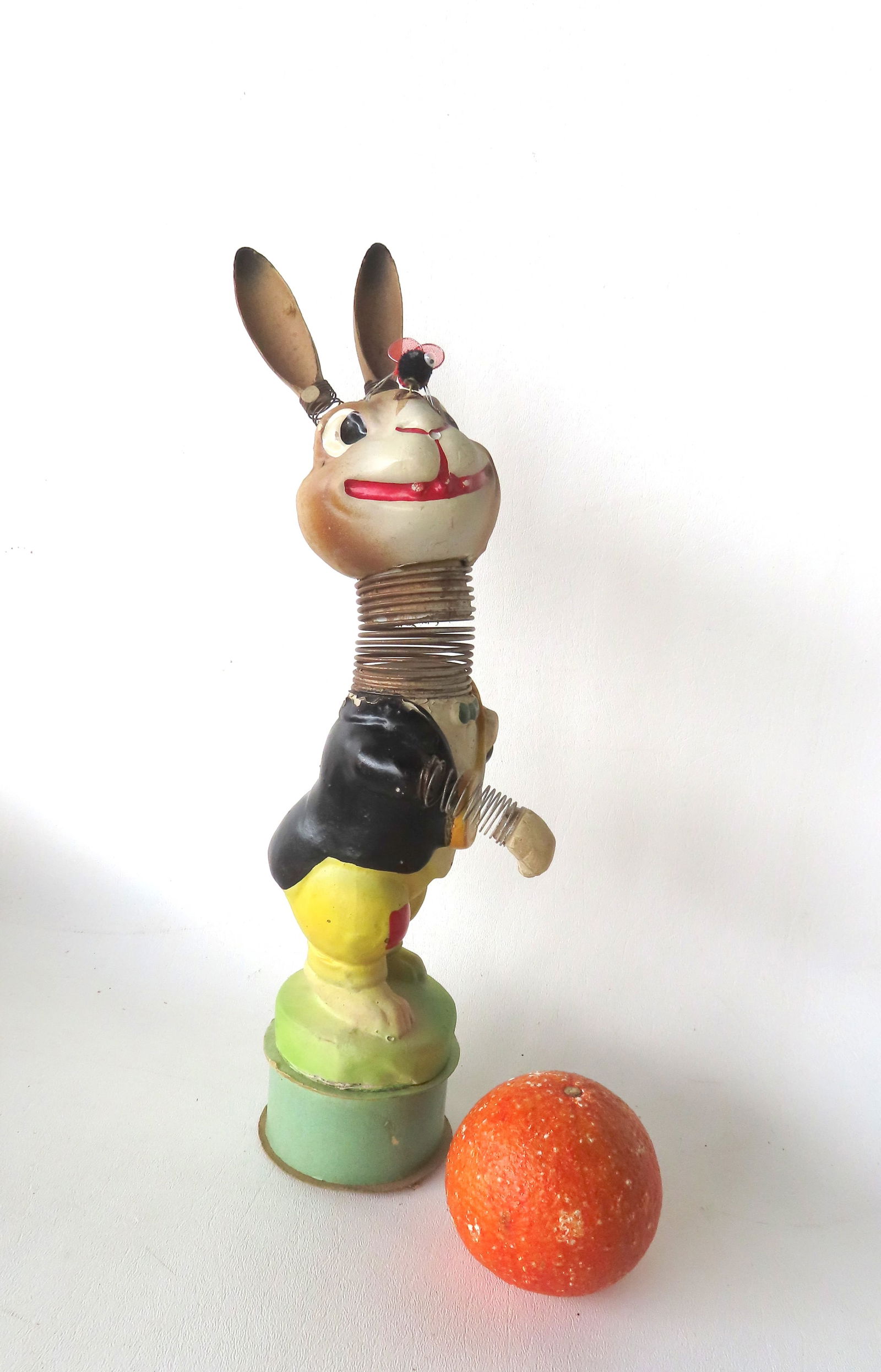 A large whimsical German Easter paper mache bobble head candy container in the form of a rabek prior (1 of 10)