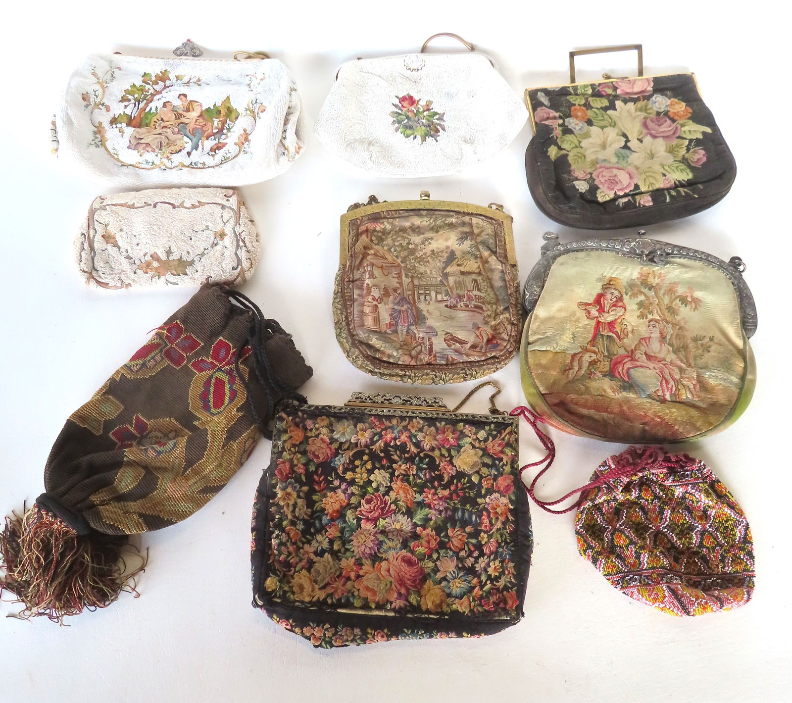 Grouping of 9 fancy purses & evening bags, including 4 decorated with tiny beads and petit point and: Grouping of 9 fancy purses & evening bags, including 4 decorated with tiny beads and petit point and having silk linings (one signed Made in France) - the largest of these 10"W x 6 3/4"H; one with fan