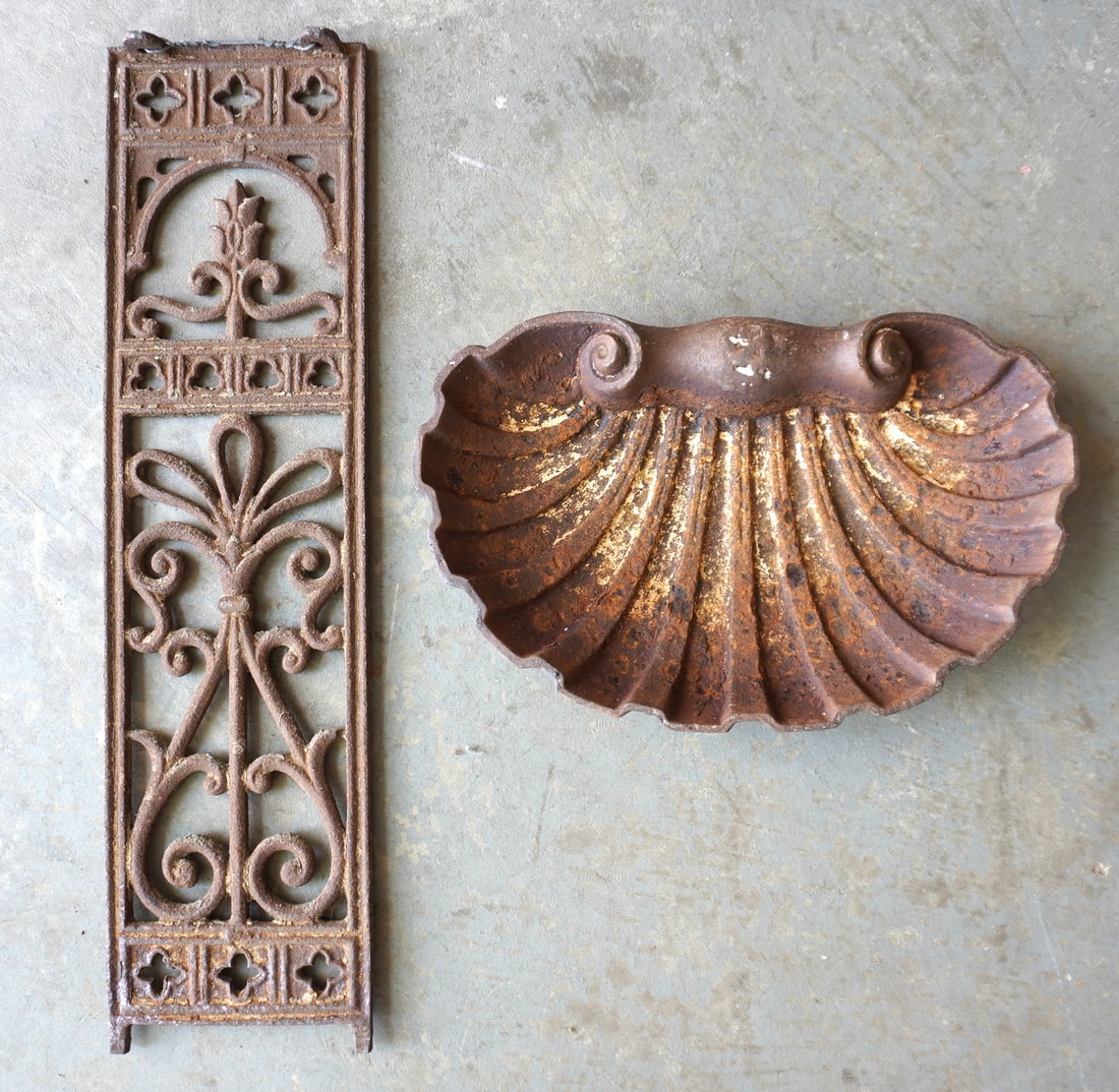 Two cast iron garden related ornaments. The first, an ornate cast iron grate, late 19th to early (1 of 3)
