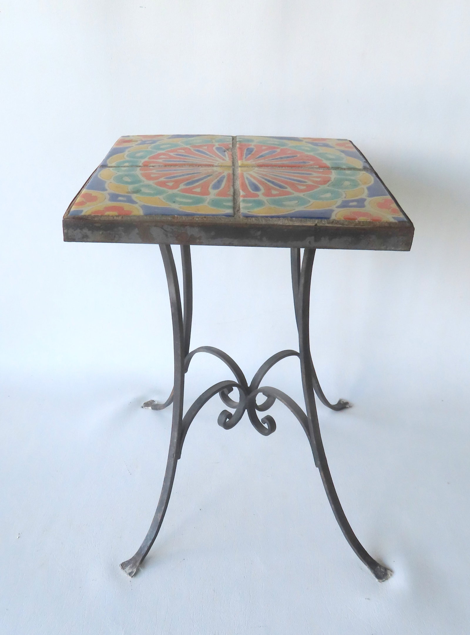 An original California Catalina tile top wrought iron end table having 4 scrolled legs and cross (1 of 6)