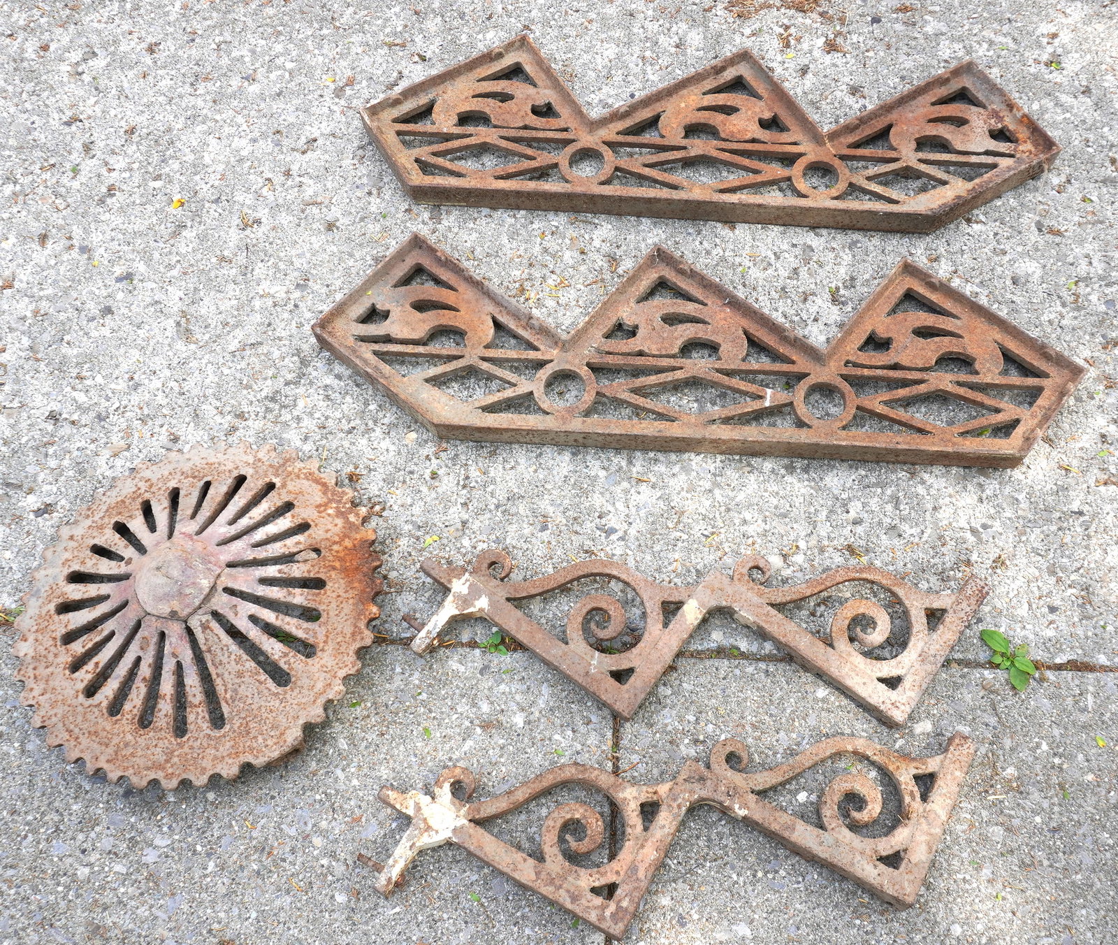 Two pair of heavy fancy cast iron stair risers, probably late 19th to early 20th century. The first,: Two pair of heavy fancy cast iron stair risers, probably late 19th to early 20th century. The first, 11" tread depth x 7 3/4" tread height - overall size for shipping purposes 42"L x 12 1/2"H; the sec