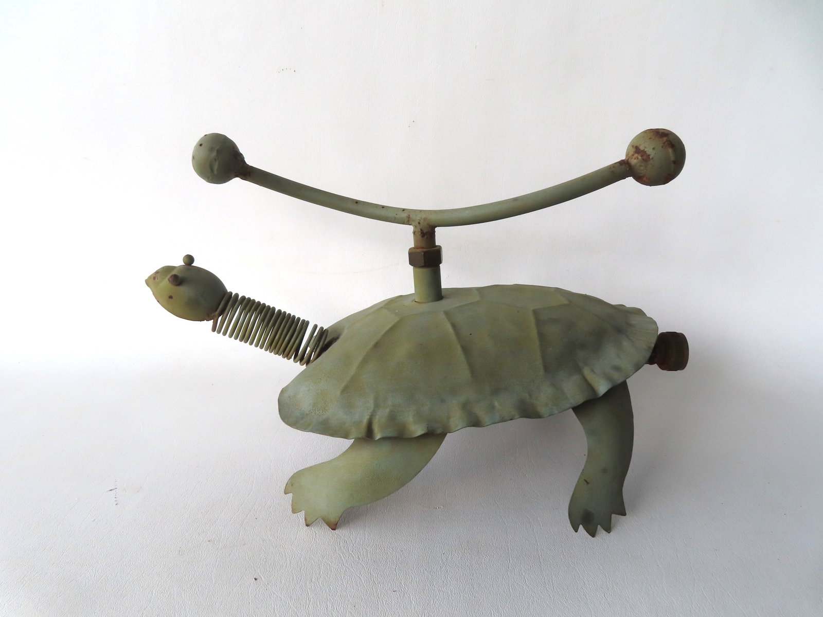 A painted tin folk art lawn sprinkler in the form of a turtle, circa 1950-70. Good original (1 of 5)