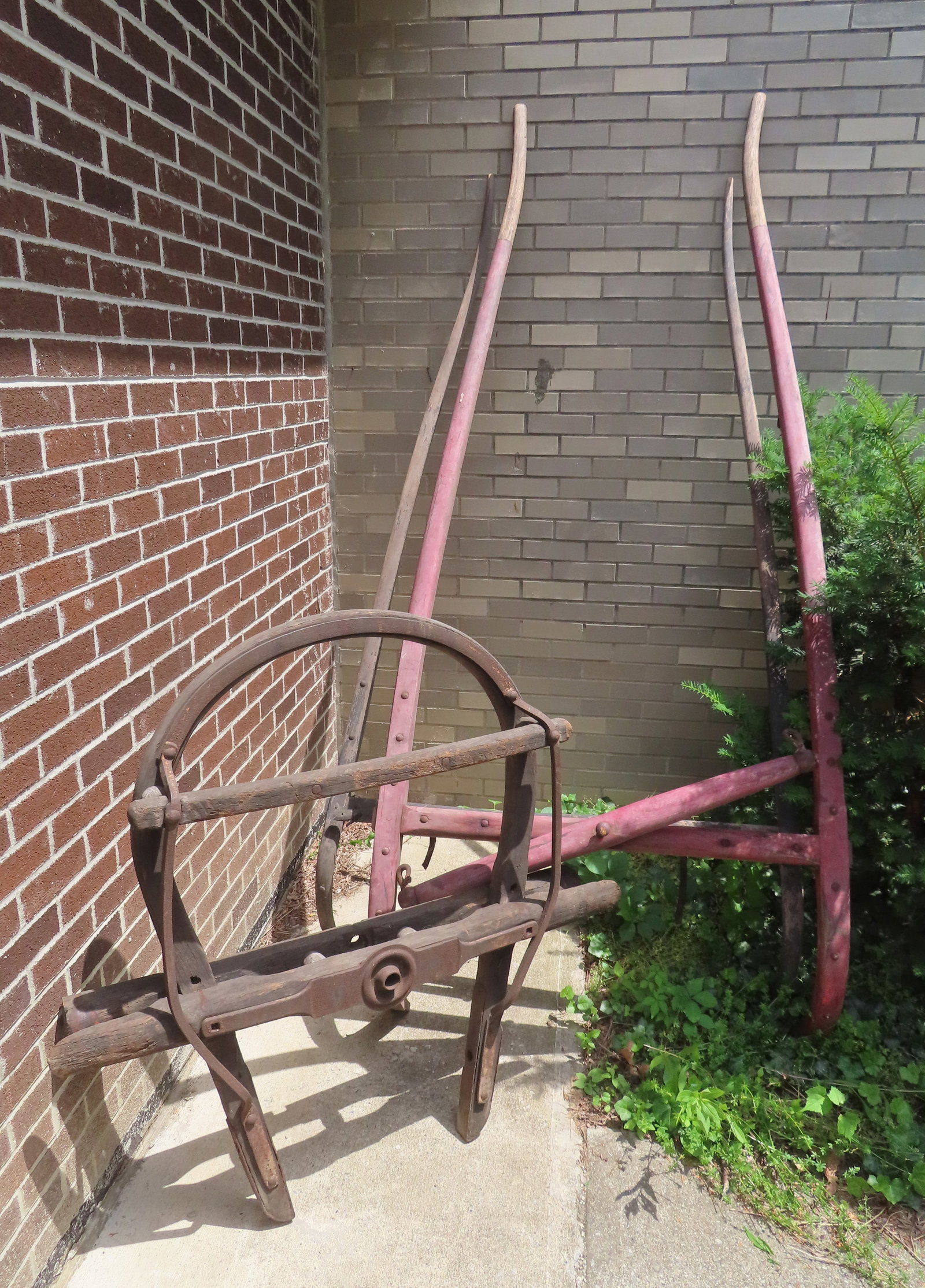 Three horse drawn wooden wagon accessories, 19th century, including: Wooden shaft, traces of (1 of 9)