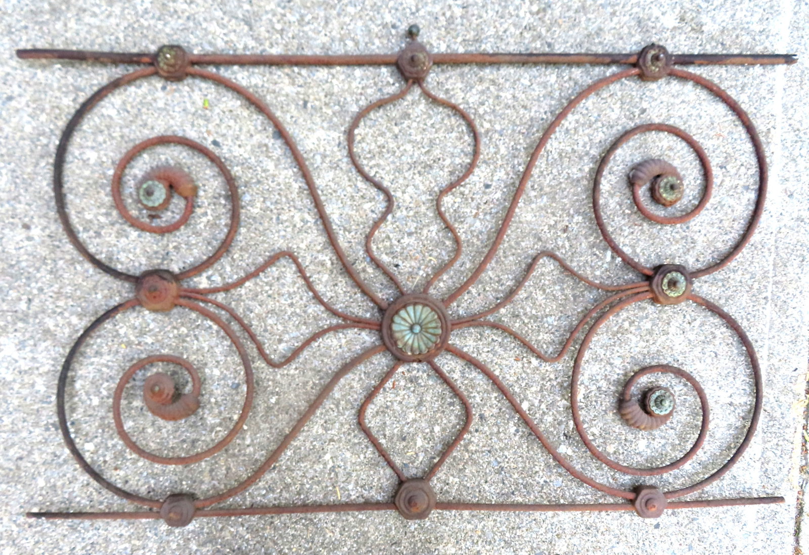 The middle section of a Victorian iron head board, decorated with sweeping scrolls with attached (1 of 6)