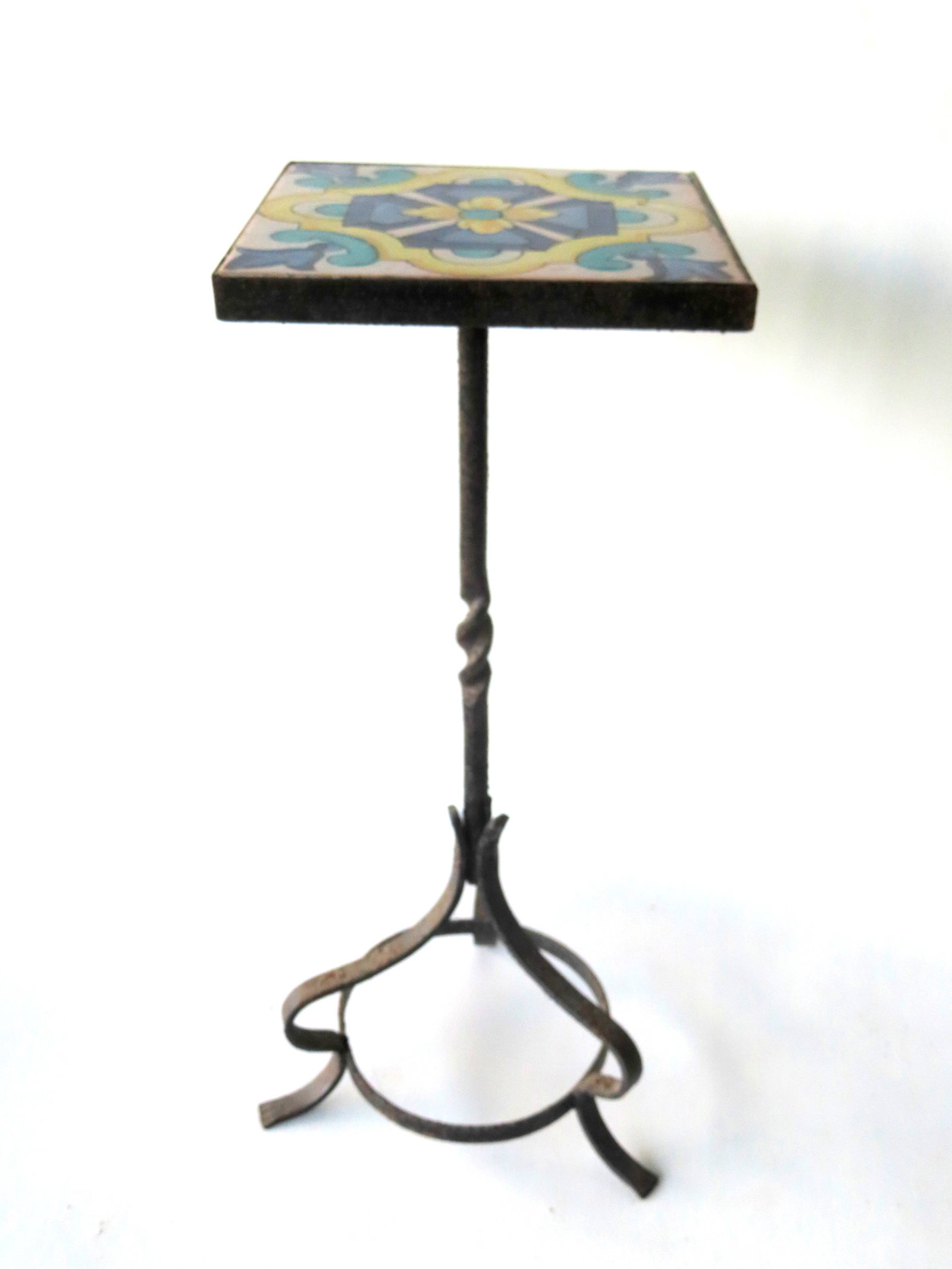 A small California Catalina plant stand with single marble top and wrought iron base with 4 scrolled (1 of 11)
