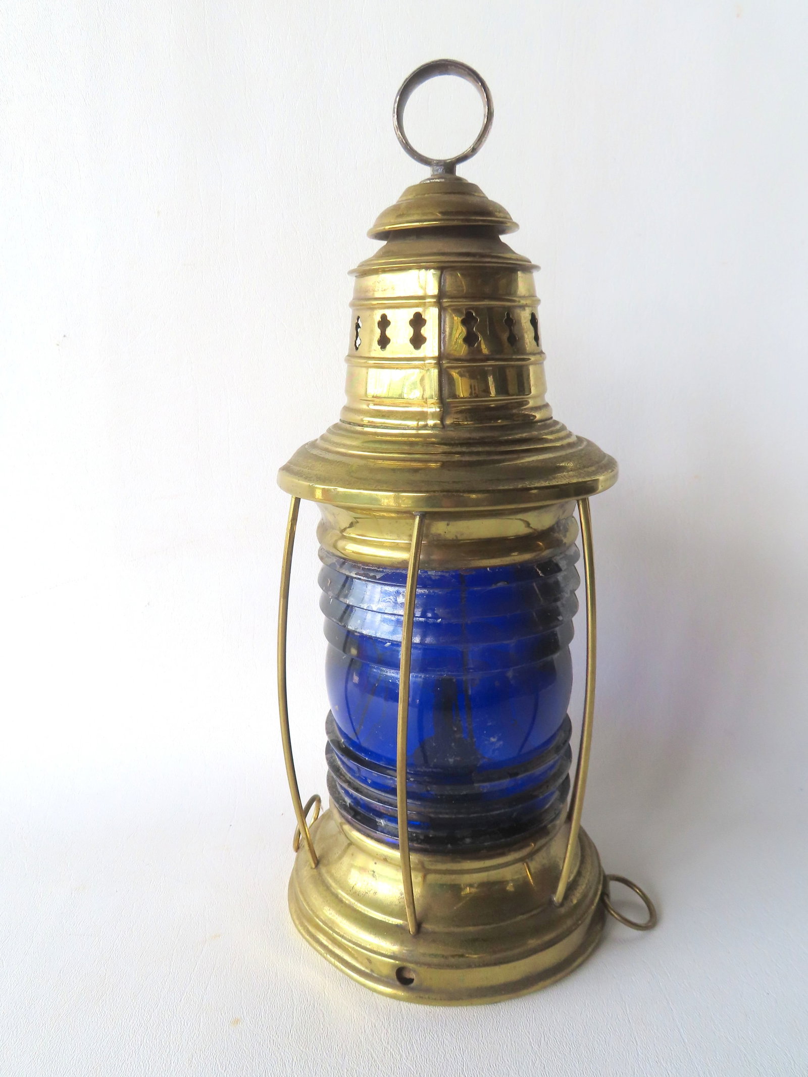 A good brass ship's lantern with original blue lense and original removeable oil burner, probably (1 of 4)