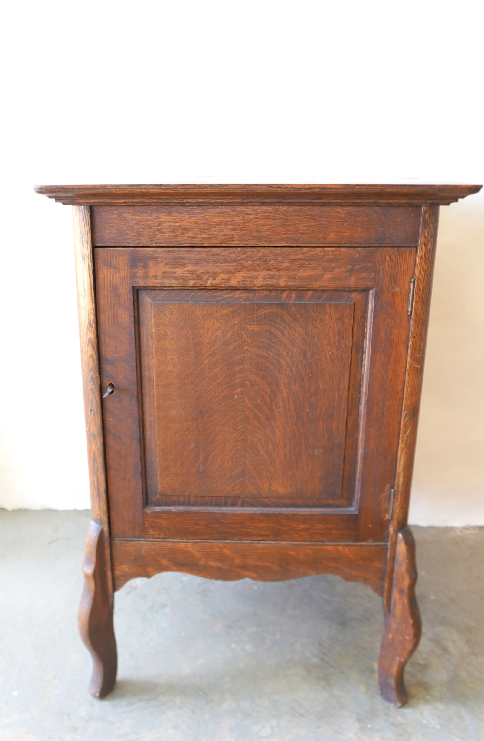 An oak single door record or disc music cabinet, with paneled door, and shaped legs - original (1 of 5)