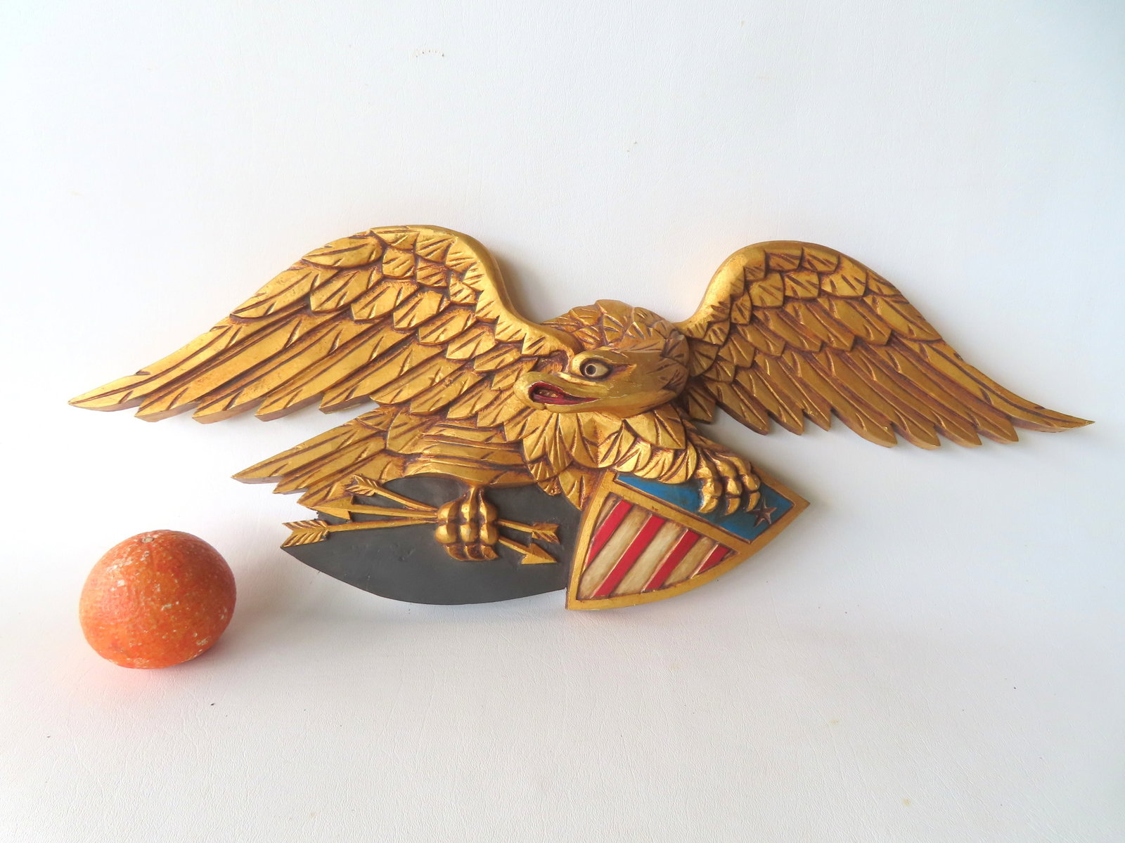 A rare Lawrence Anderson carved wooden spread wing eagle wall plaque in original guilding with (1 of 4)