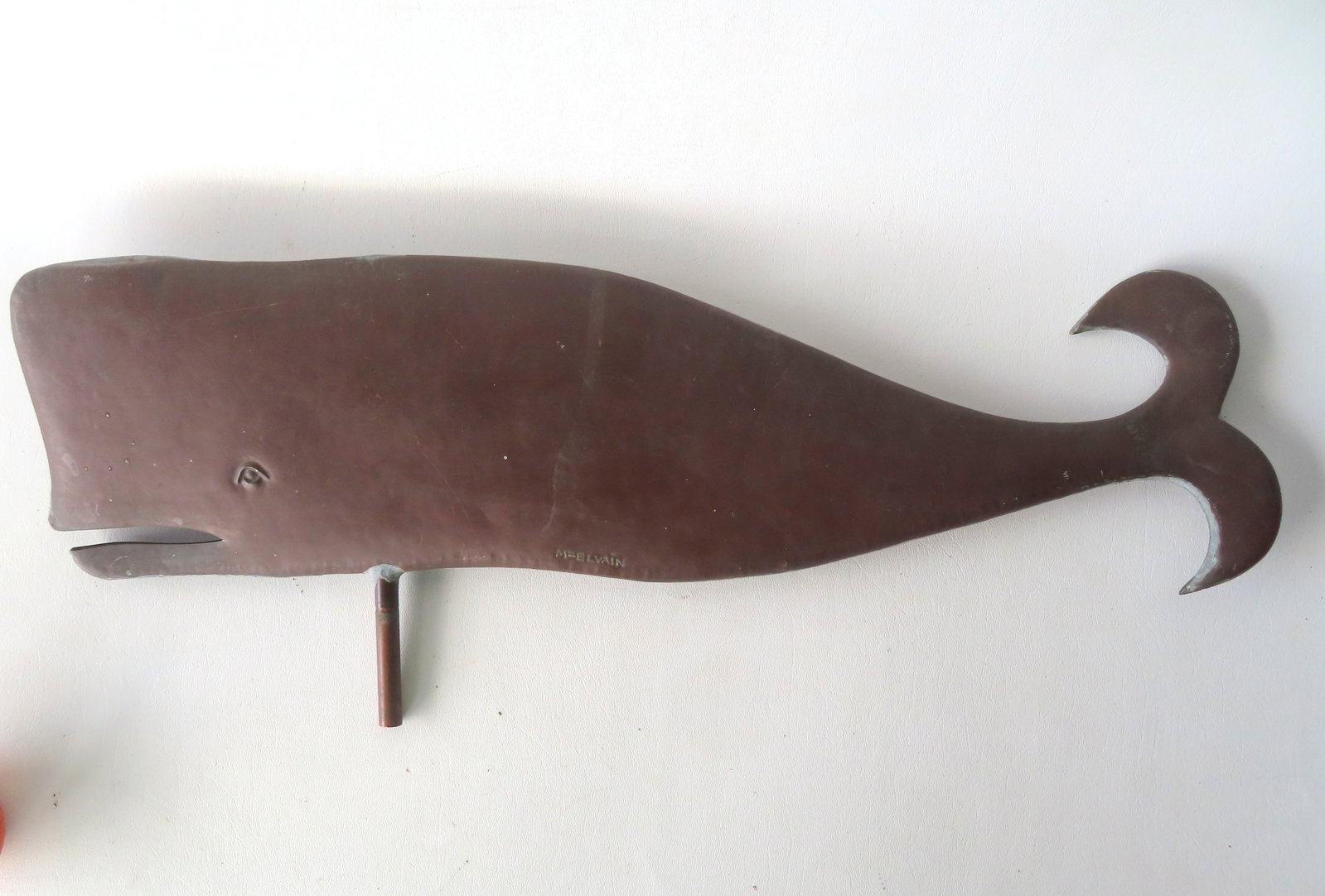 A copper Whale weathervane, flattened body, hand hammered and signed (impressed) "McElvian" (William (1 of 10)