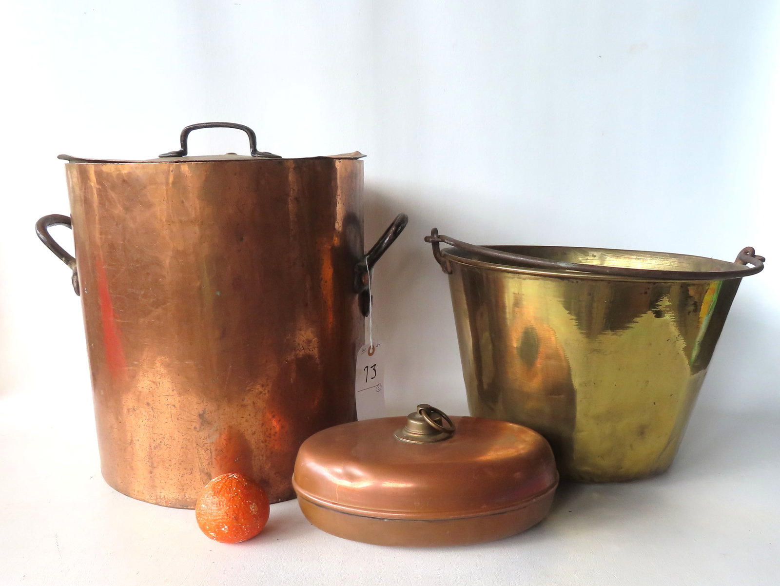 Three early copper collectibles including: A spun brass apple bucket with a hand forged iron handle (1 of 14)