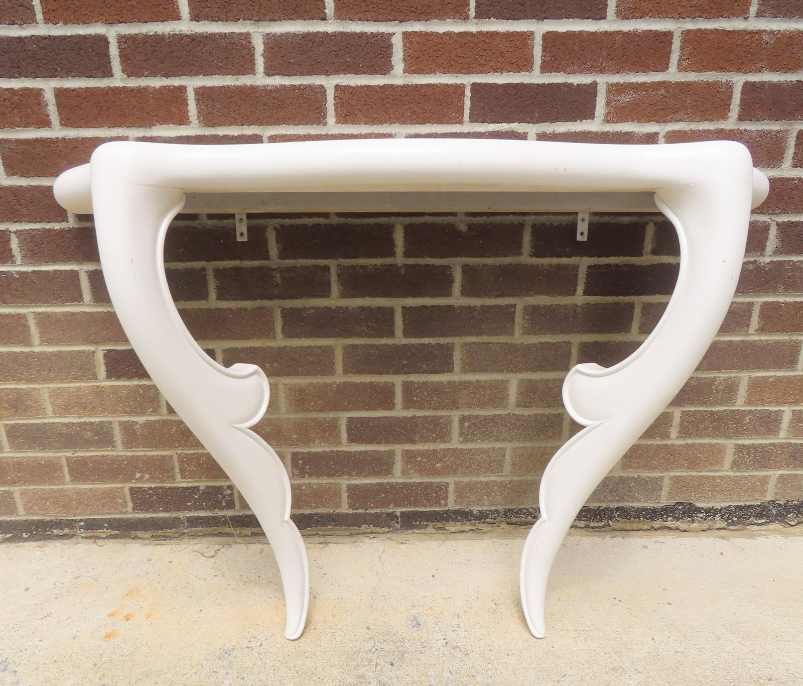 A modern style wooden demuline entrance-way table with serpentine front, 2 shaped front legs in (1 of 3)