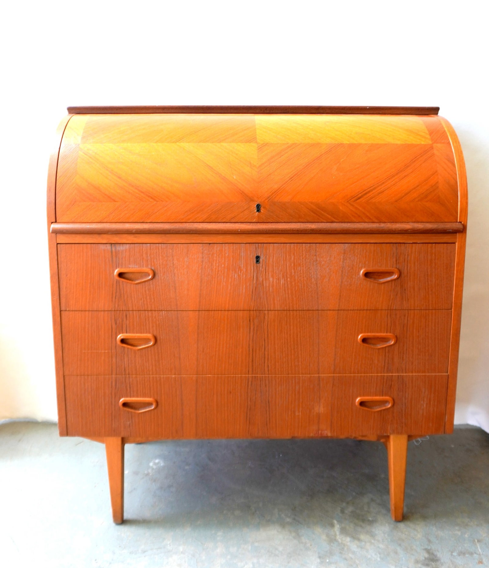 A mid-century modern style (Danish or Norwegian) cylinder roll-front desk with fitted cubby hole (1 of 10)