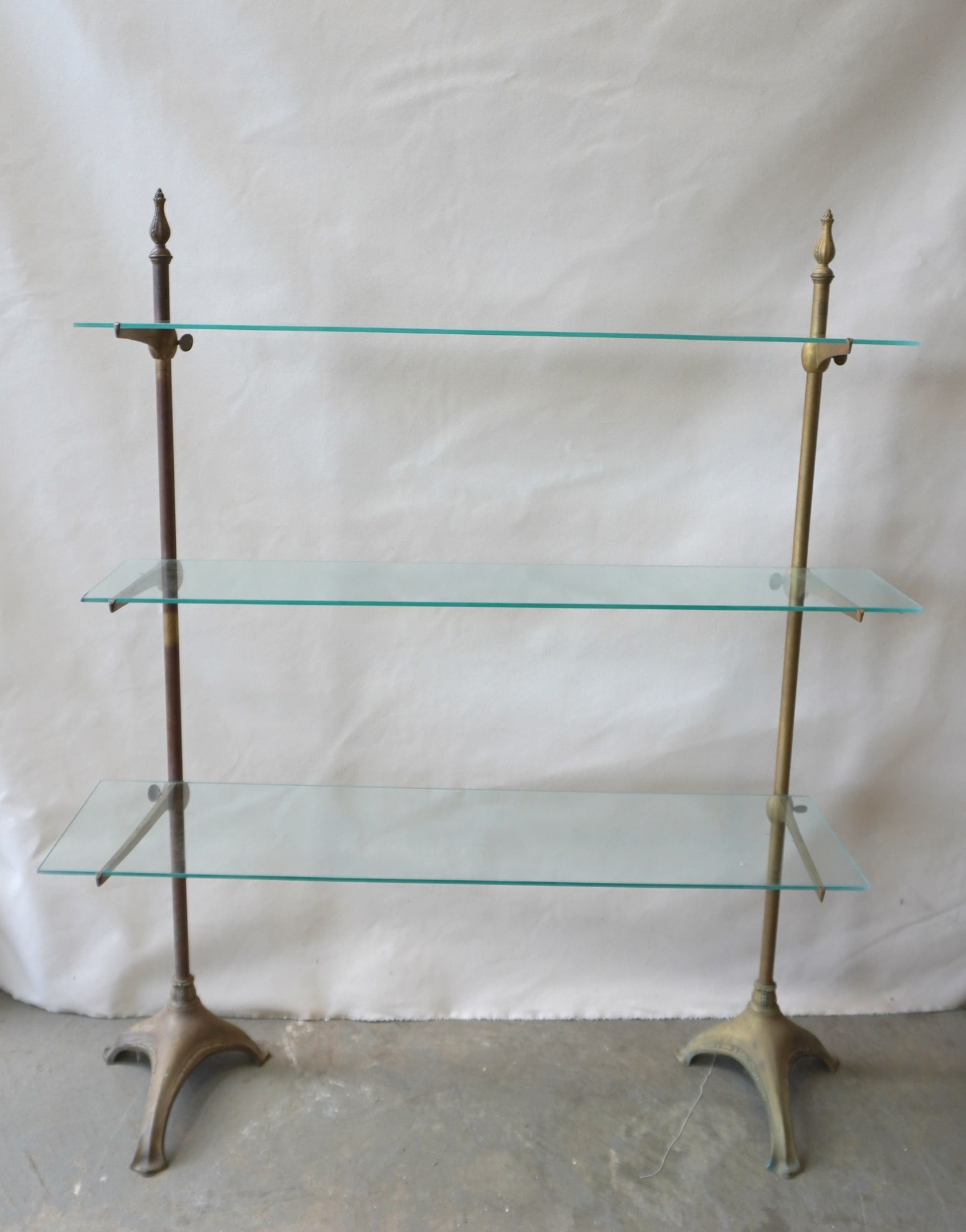 A brass French country store floor standing open shelf unit with turned finials, and having 3 (1 of 9)