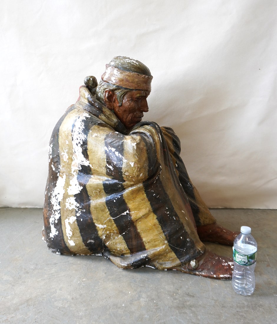 A scarce life-size plaster sculpture of a seated Native American with wearing blanket, in deep (1 of 11)