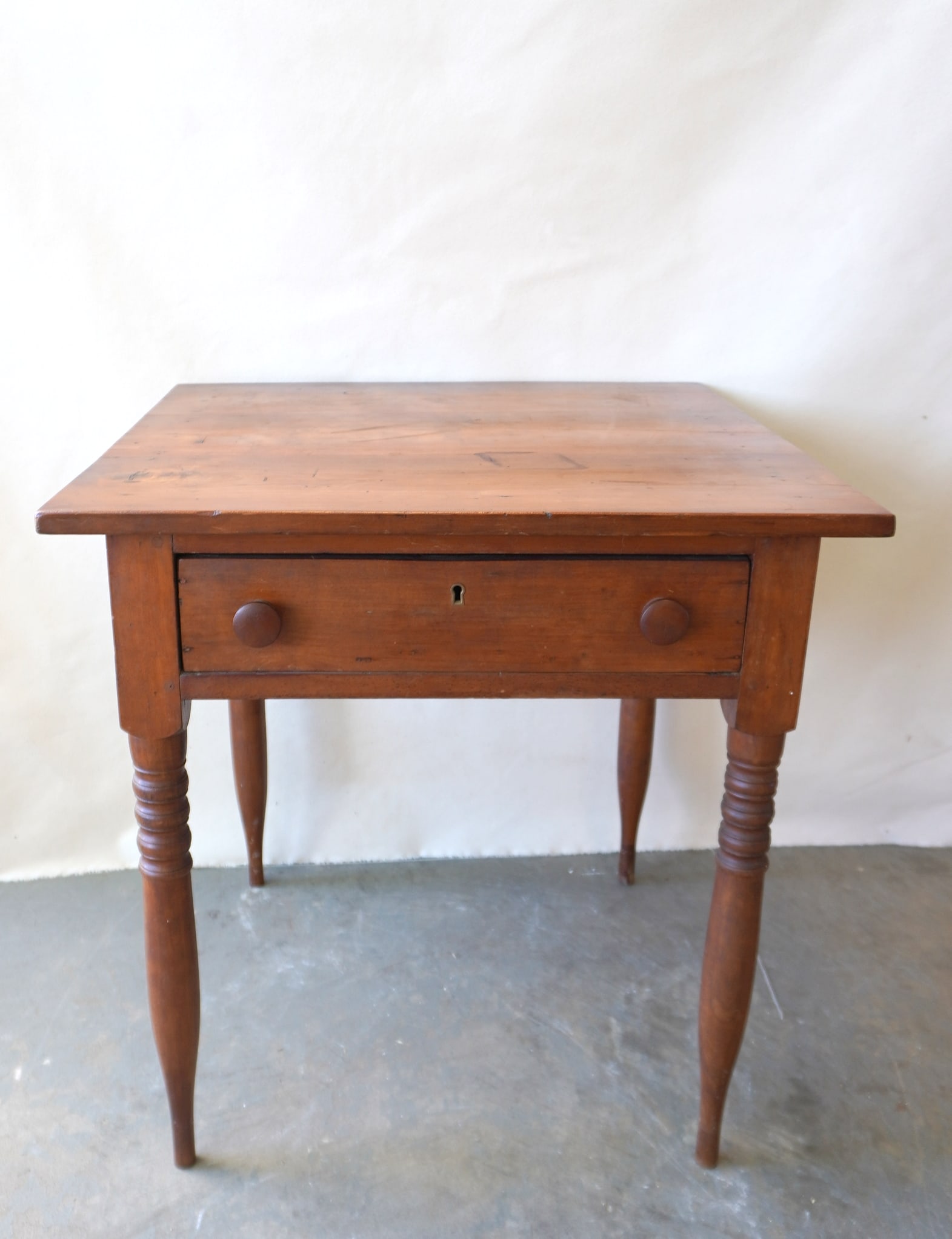 A cherry work table with single drawer and unique turned and tapered legs in the Sheraton style, (1 of 6)