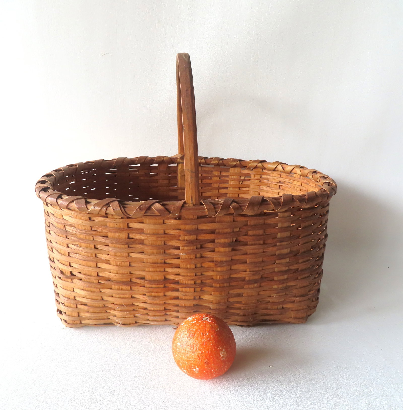 An early splint basket with a single overhead handle, having many of the characteristics of an (1 of 6)