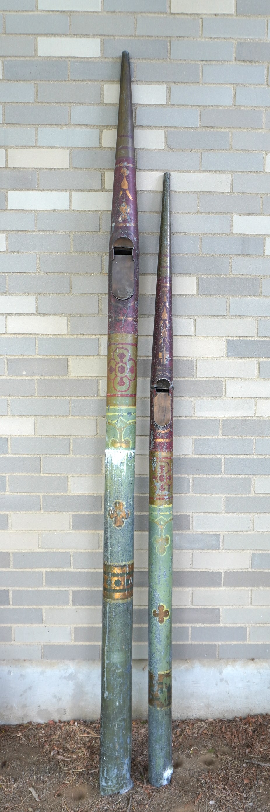 Two folk art hand painted organ pipes (constructed of "pipe metal" to create richer tones - lead and: Two folk art hand painted organ pipes (constructed of "pipe metal" to create richer tones - lead and tin alloy) in original paint, 19th century. The smallest, 77 1/2"H x 3"W at base - with paint wear,