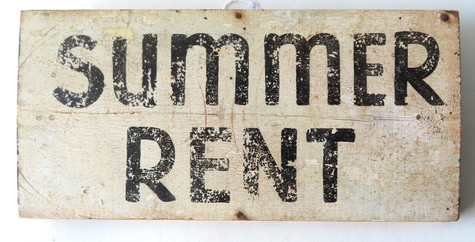 An old wooden advertising sign marked "SUMMER RENT", in original black and white paint, mid 20th (1 of 3)