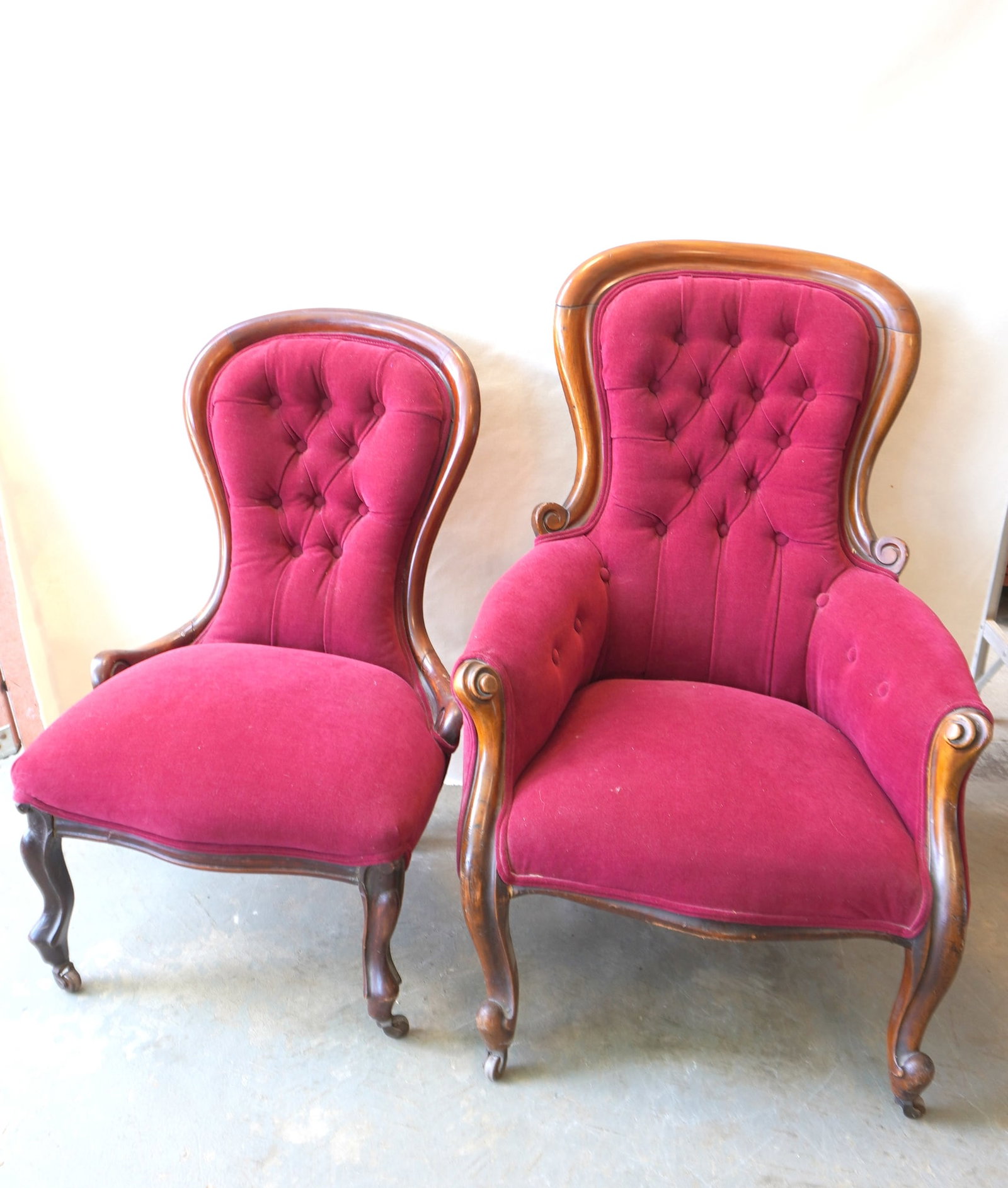 A pair of Victorian lady's upholstered parlor chairs with carved walnut frames and newer red (1 of 5)