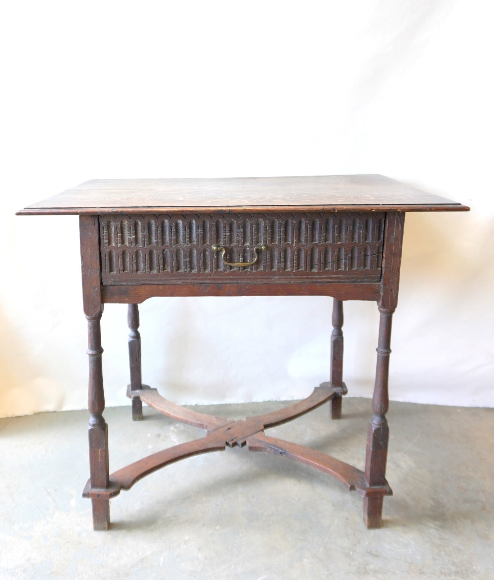 An English oak 17th/18th century make-do work table with single drawer and shaped cross stretchers. (1 of 8)