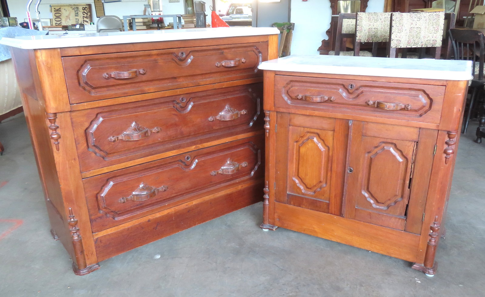 A Victorian black walnut marble top dresser with secret lower drawer - 41"W x 18"D x 34 1/2"H and a: A Victorian black walnut marble top dresser with secret lower drawer - 41"W x 18"D x 34 1/2"H and a matching marble top washstand with single drawer over 2 doors - 29 1/2"W x 16"D x 30"H. The dresser 