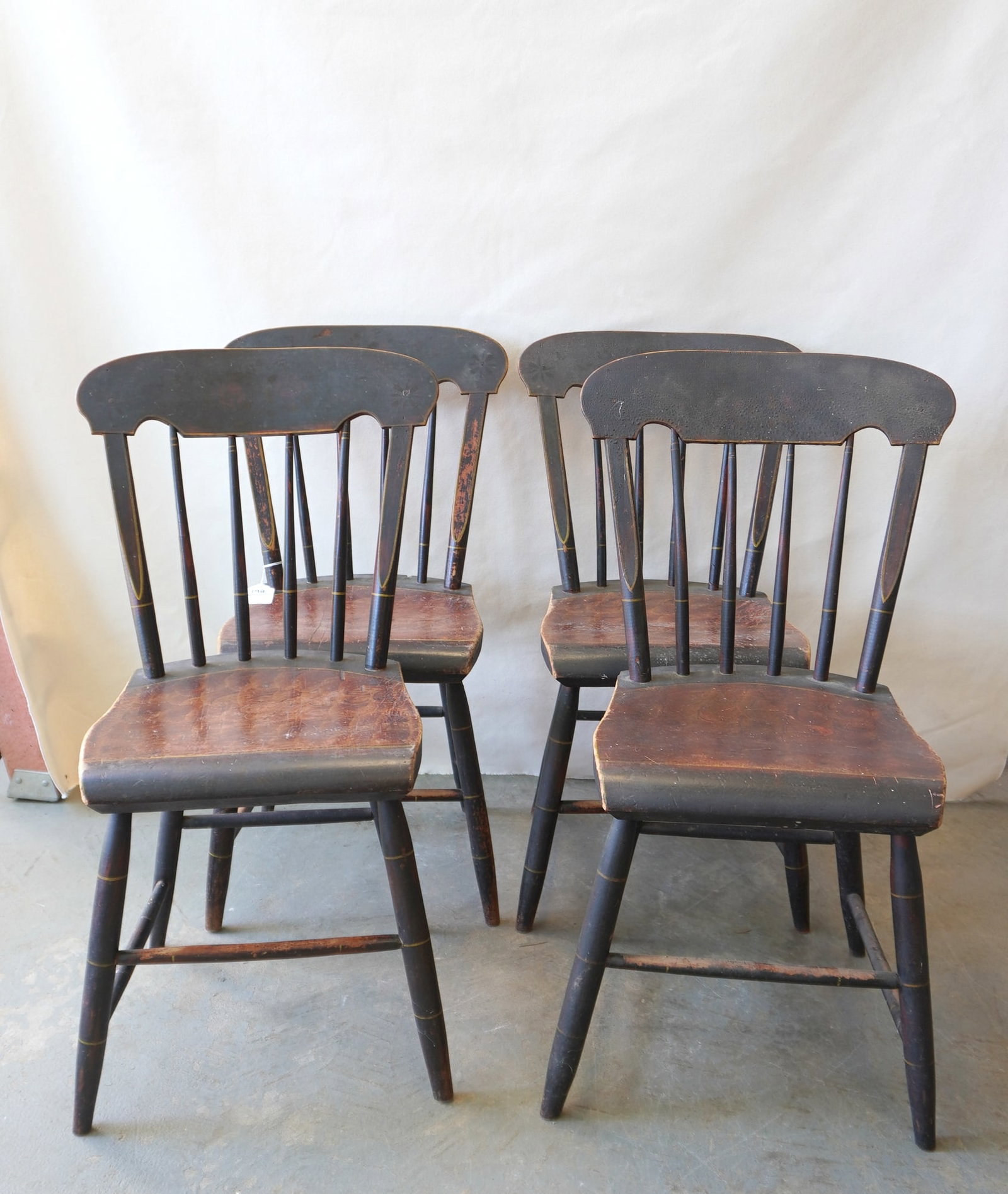 Set of 4 country Sheraton stenciled and hand painted chairs, saddle seats with sponge decorations: Set of 4 country Sheraton stenciled and hand painted chairs, saddle seats with sponge decorations and back crest with floral stencils (stencils have darkened with age and appear to have an old varnish