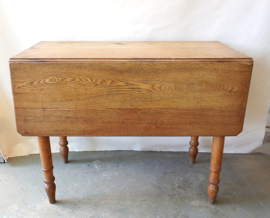 A country drop-leaf kitchen table with chestnut top and turned maple legs, circa 1860-80. Very good (1 of 13)