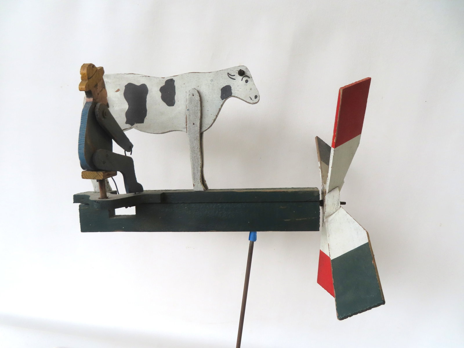 Whirligig of farmer milking cow in original paint, mid to late 20th century in good working (1 of 8)