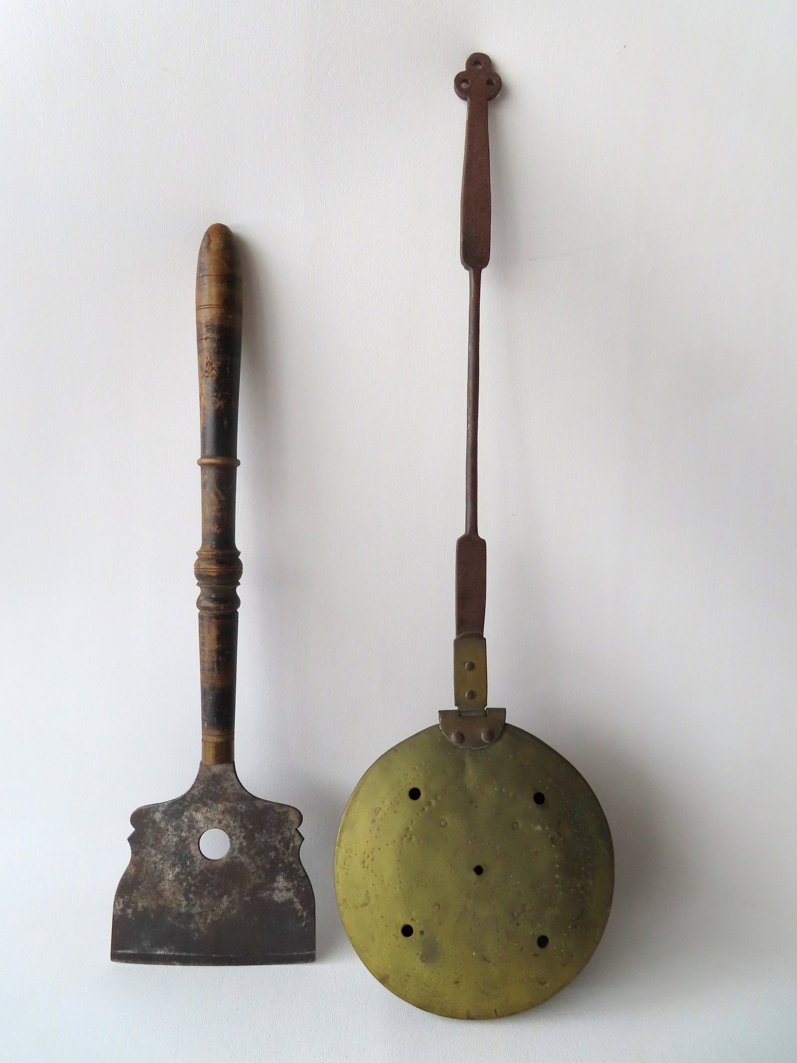 Two early kitchen utensils. The first a hammered copper chestnut roaster with dovetailed base and (1 of 11)