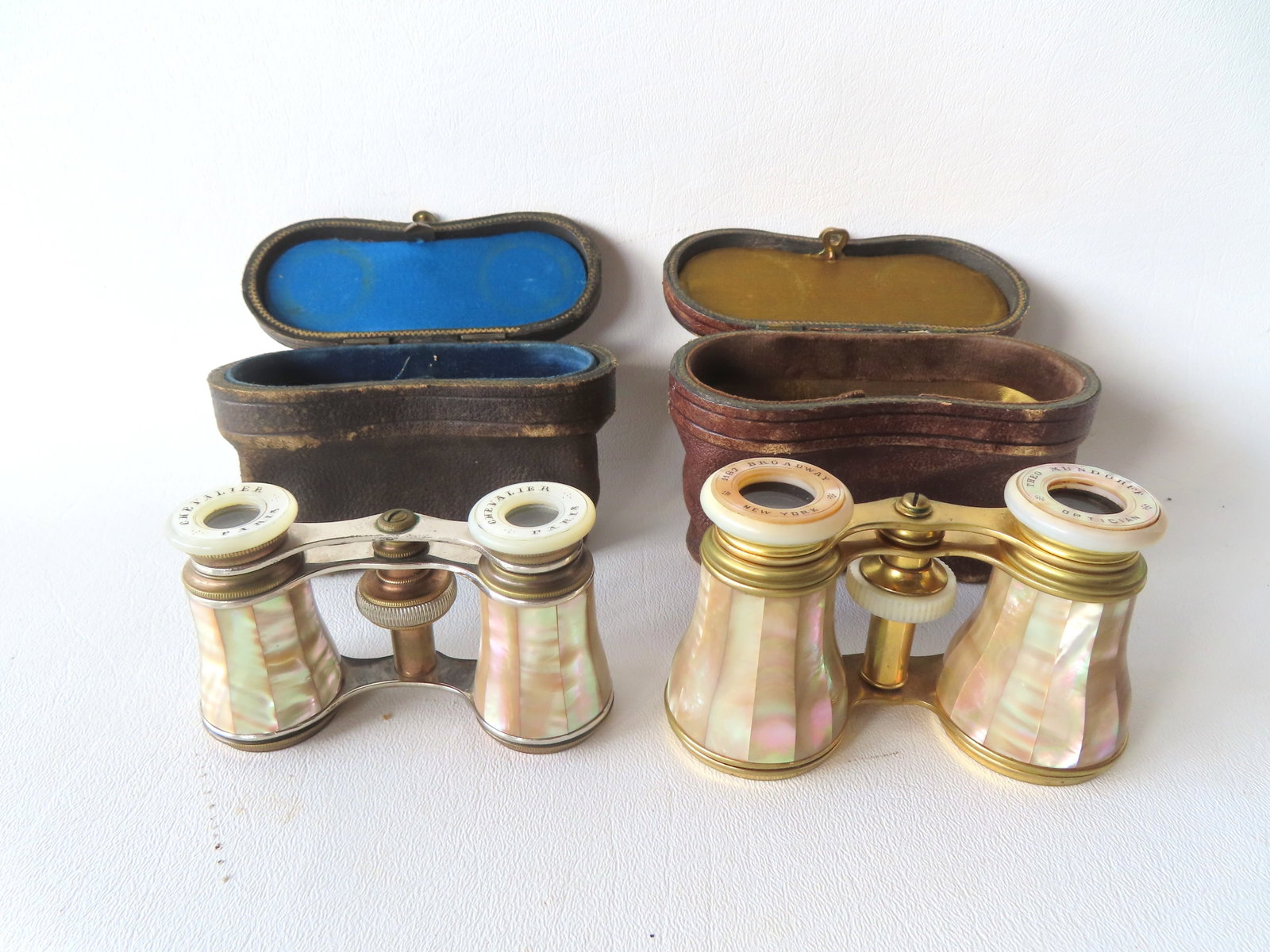Two pairs of French opera glasses in original leather cases - one signed Chevalier Paris and the (1 of 4)