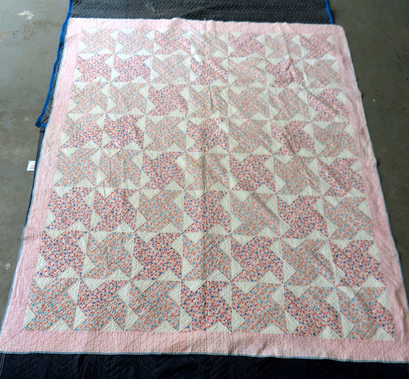 A good hand sewn patchwork quilt in the xx pattern, circa 1900. Measures 80" x 68". Very good: A good hand sewn patchwork quilt in the xx pattern, circa 1900. Measures 80" x 68". Very good condition.