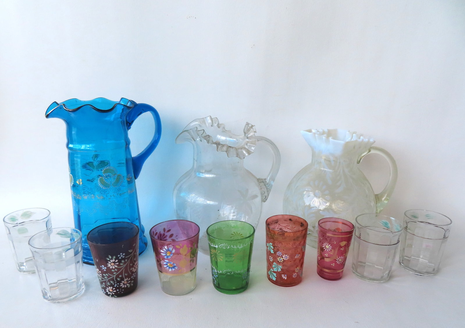 Grouping of 12 pieces of beautiful Victorian art glass including: Three lemonade pitchers with (1 of 15)
