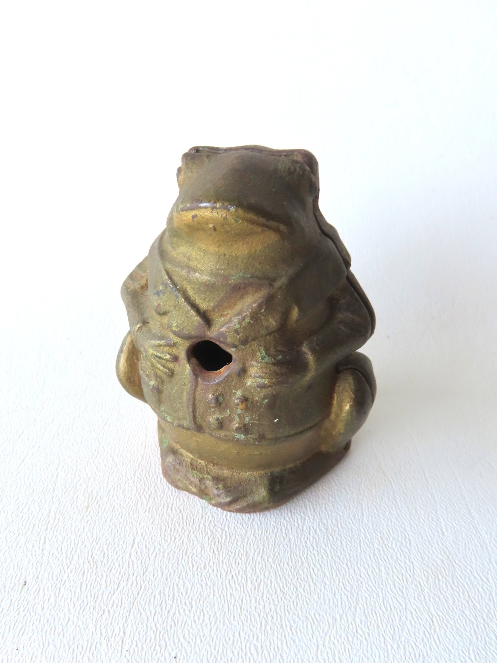 A cast iron "Professor Pug" frog penny still bank, made by the A.C. Williams Company in 1905-1912,: A cast iron "Professor Pug" frog penny still bank, made by the A.C. Williams Company in 1905-1912, in original gold paint - missing the twist pin and screw that holds body together, some surface-only 