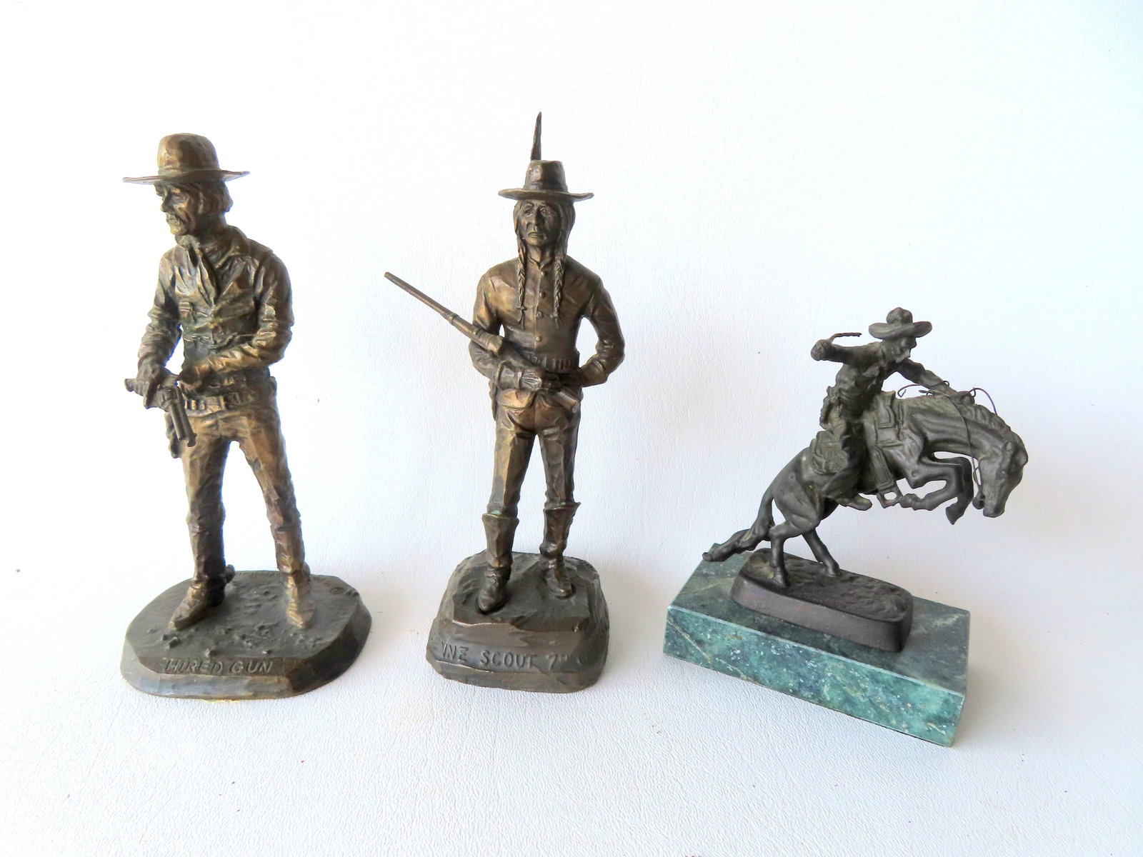 Three western bronzes including: Two signed Phil Kraczkowski (1916 - 1996) was active/lived in (1 of 10)