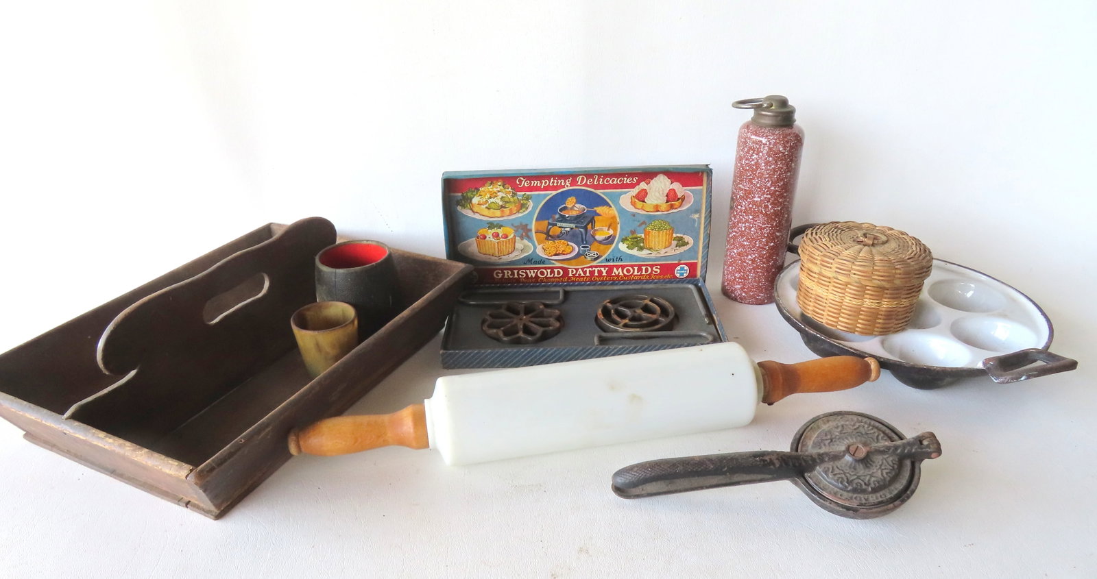Grouping of country collectibles including cutlery box, milk glass rolling pin, various molds (1 of 7)