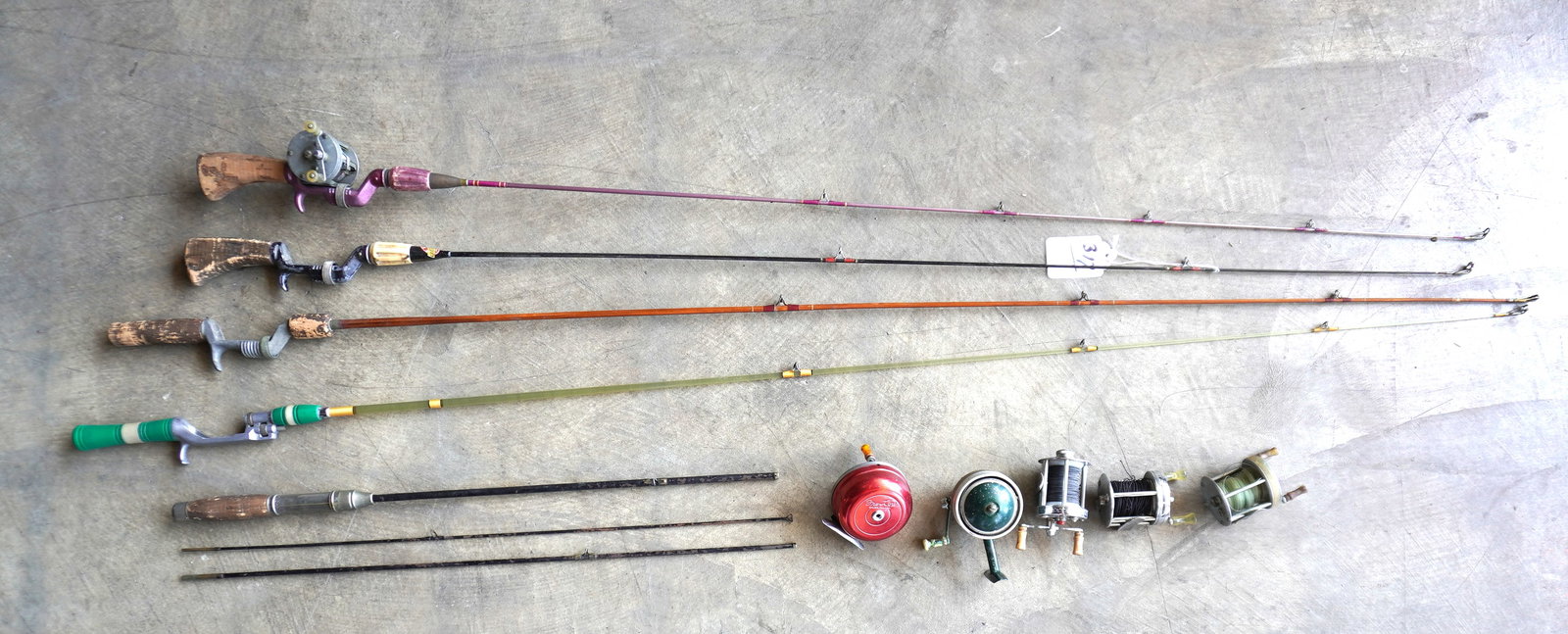 Grouping of 5 vintage fishing rods and 6 bait casting reels. Rods including a metal "Mohawk" 3 (1 of 12)