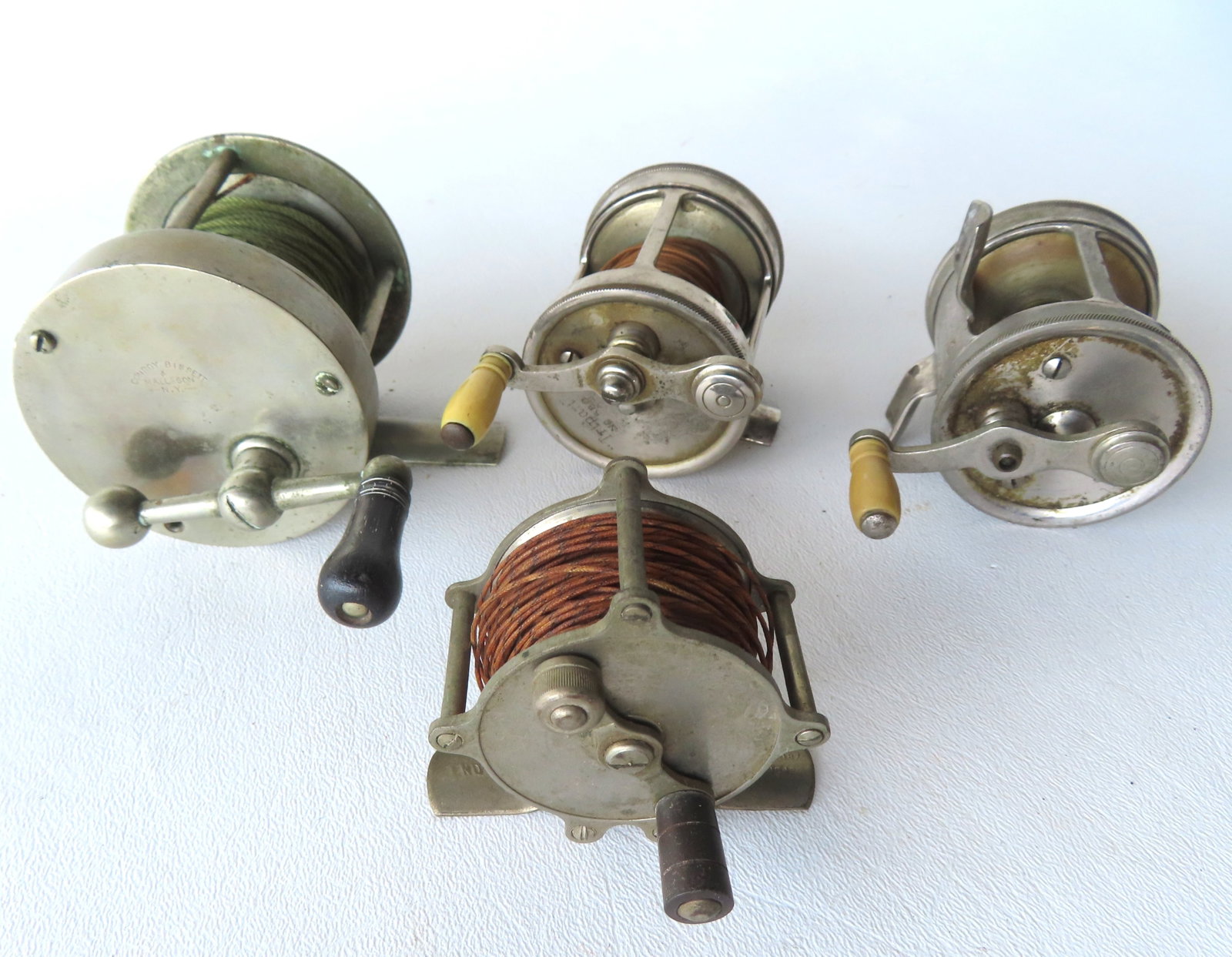 Grouping of 4 good early fishing reels including: Conroy, Bissett & Malleson NY - active 65 Fulton (1 of 14)