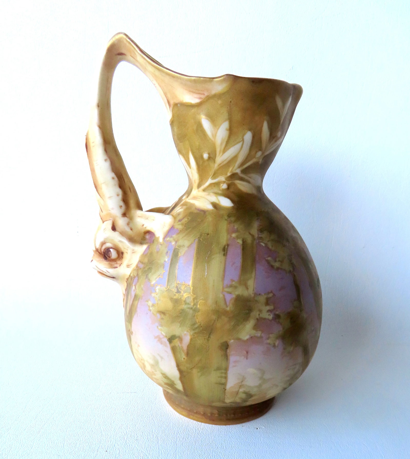 A very fine Amphoria Turn-Tepliz Bohemia ewer with dolphin handle and hand painted woodlands scene -: A very fine Amphoria Turn-Tepliz Bohemia ewer with dolphin handle and hand painted woodlands scene - also signed RStK on base, circa 1900. Excellent condition, no damage or repairs. Measures 8"H x 5 1