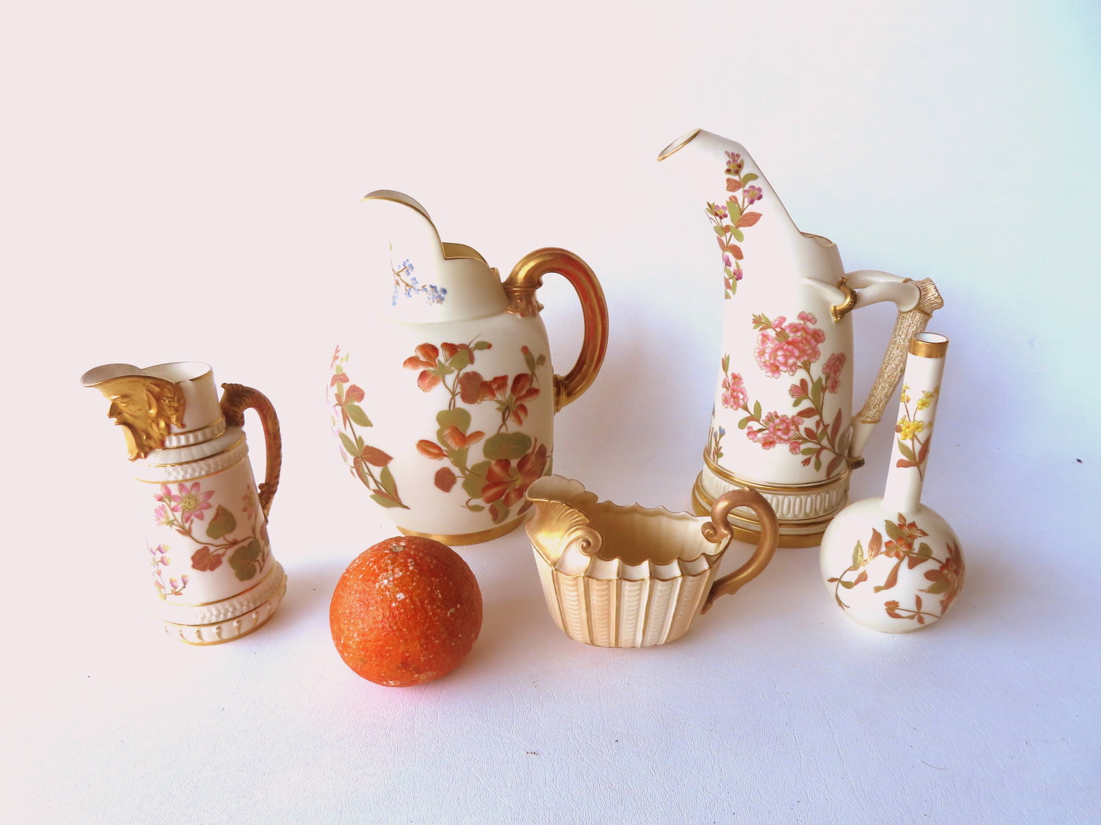 Five Royal Worcester porcelains including: Water pitcher decorated with flowers - very good: Five Royal Worcester porcelains including: Water pitcher decorated with flowers - very good condition, no damage or repairs - measures 9 1/8"H x 7"W; ewer decorated with flowers and having a porcelain
