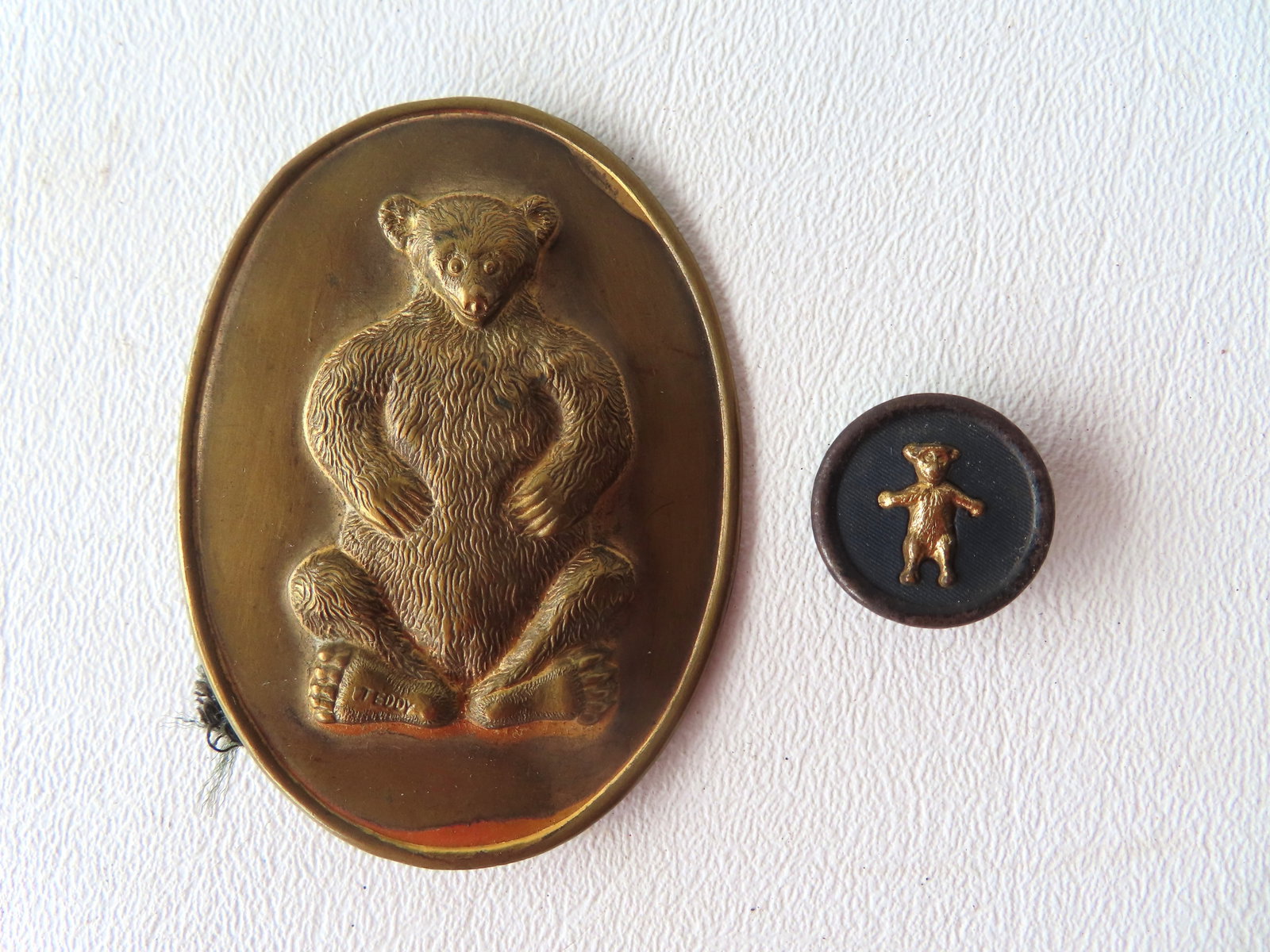 Two vintage tin Teddy Bear buttons, possible related to a Teddy Roosevelt campaign. The first, a (1 of 2)