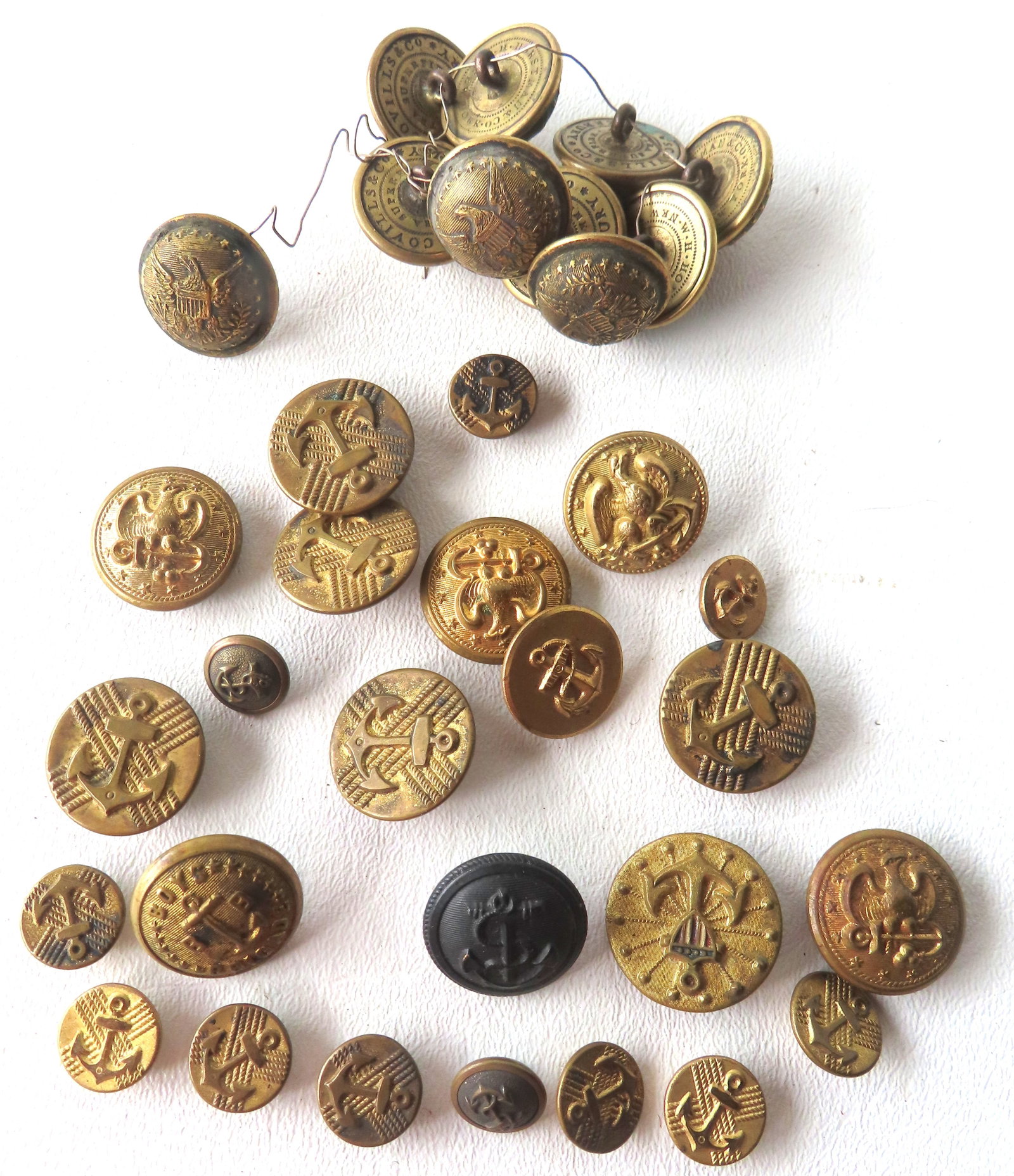Grouping of 34 military buttons including: 24 various Naval buttons, various sizes, 19th & 20th (1 of 7)