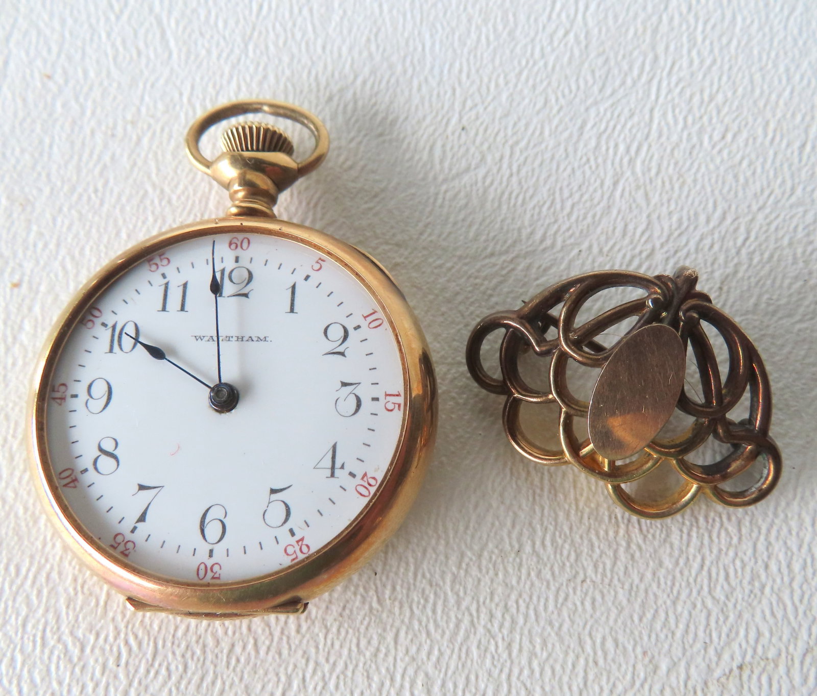 A Waltham 14k gold lady's pendant watch - marked on interior "Keystone 14K 4731599" - wound tight (1 of 5)
