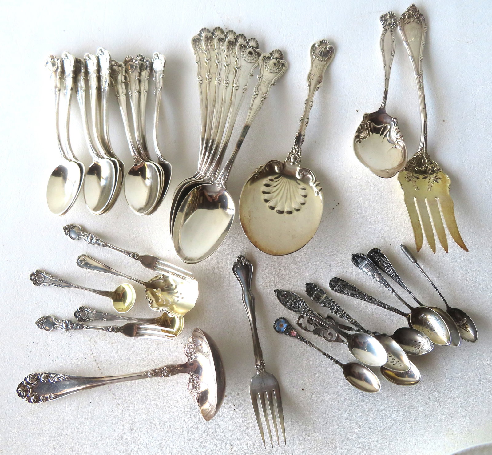 A grouping of sterling silver flatware including: 6 dinner spoons & 10 teaspoons signed Bailey, (1 of 6)